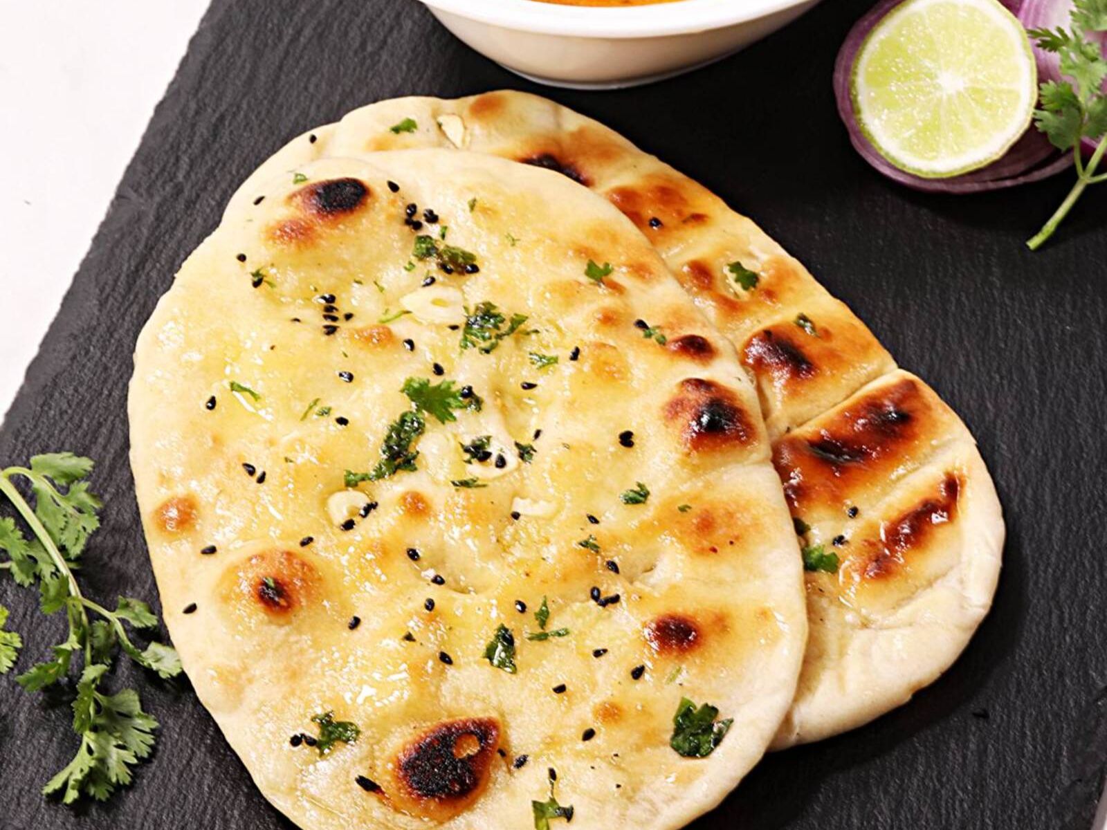 Butter Naan { Starts From 12pm }.