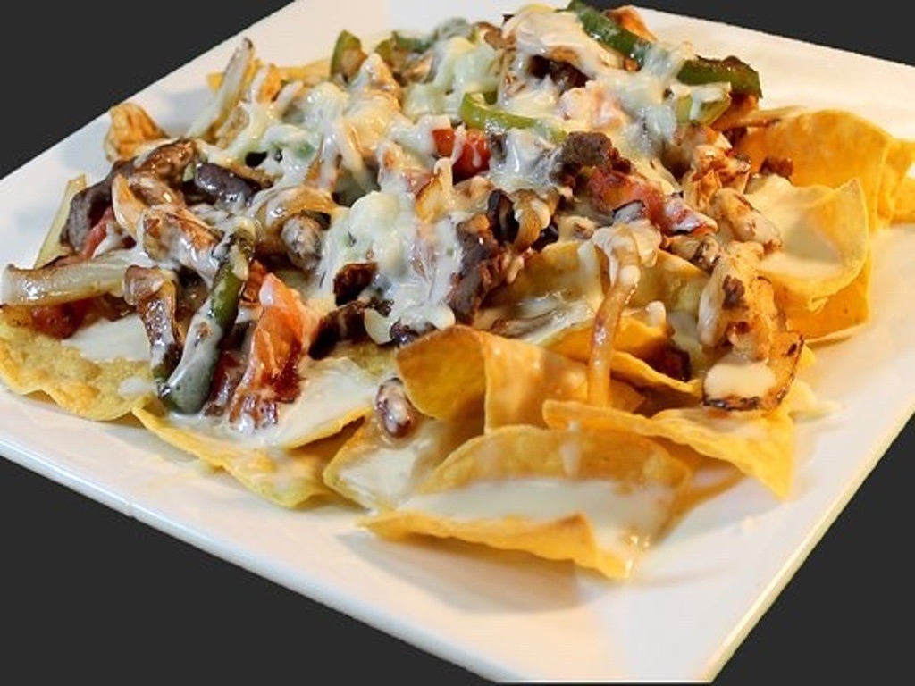 NACHOS WITH STEAK.