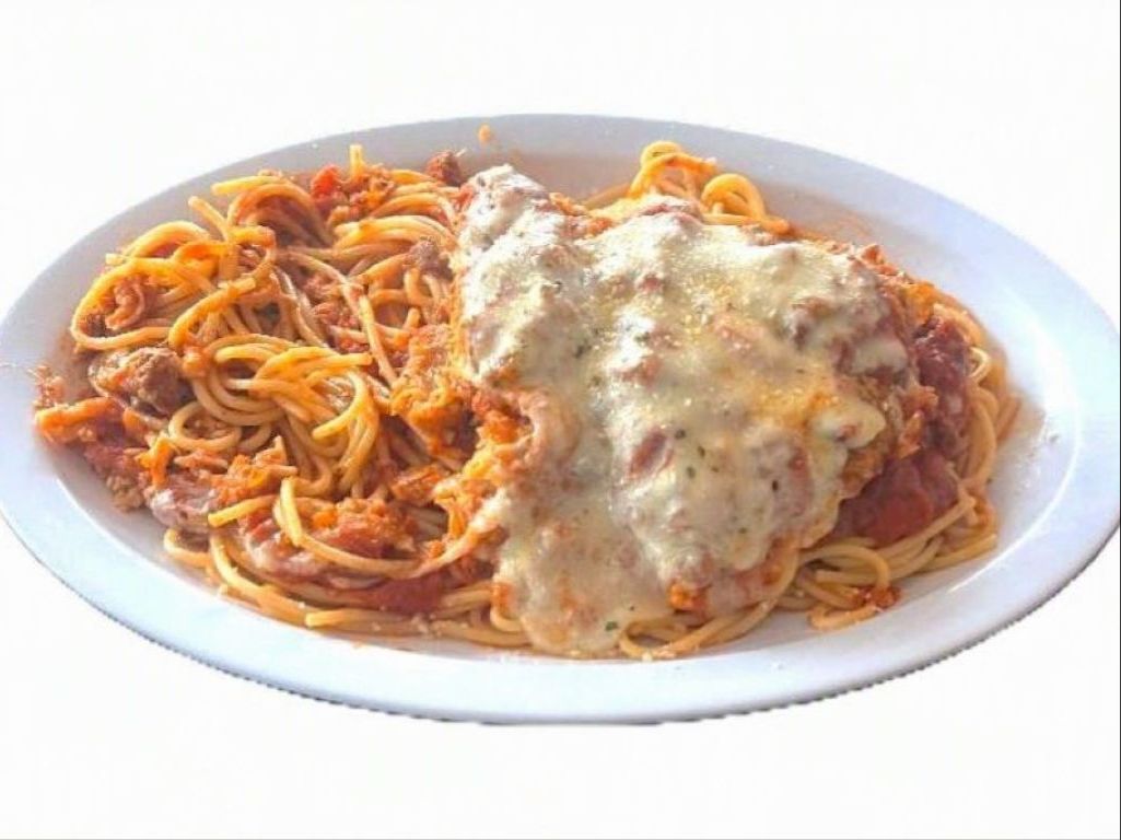 Chicken Parmesan Over Spaghetti.