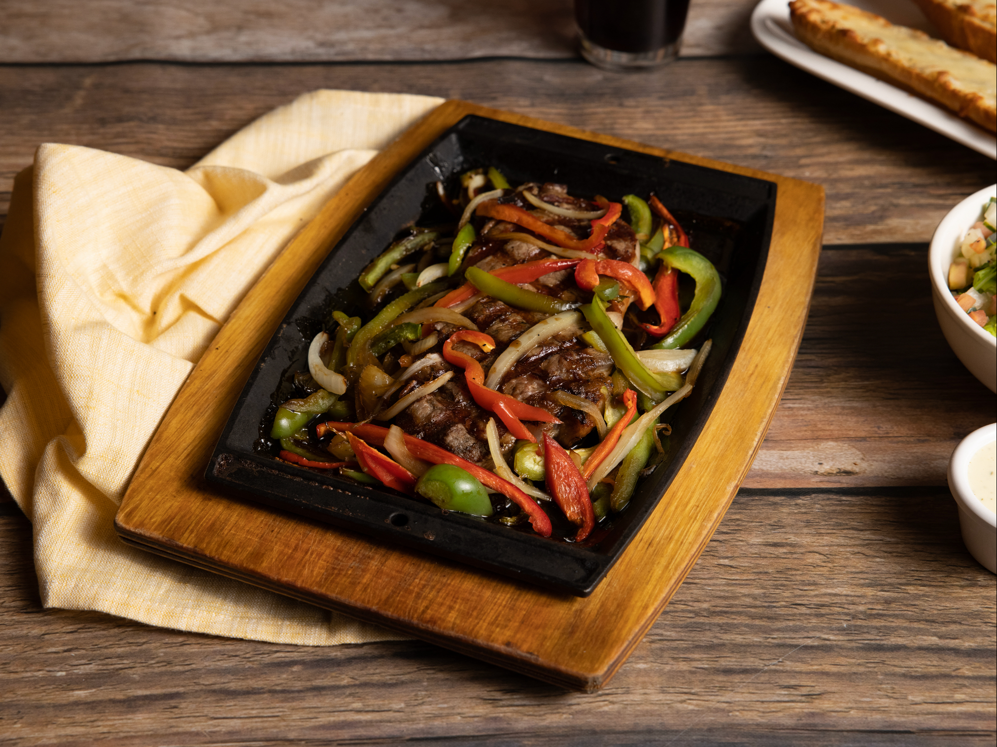 Sizzing black pepper steak.