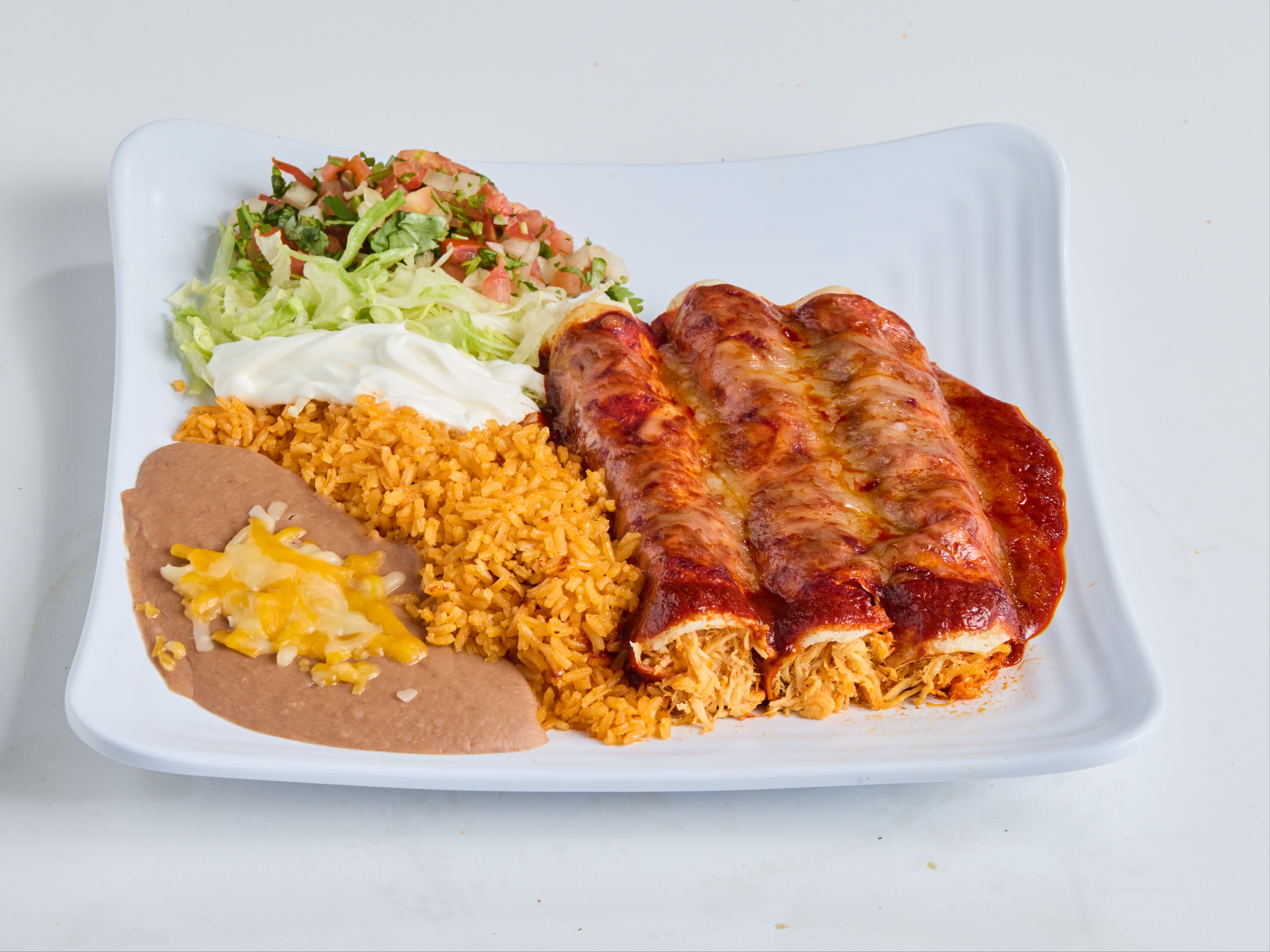 (10) Enchiladas Plate.
