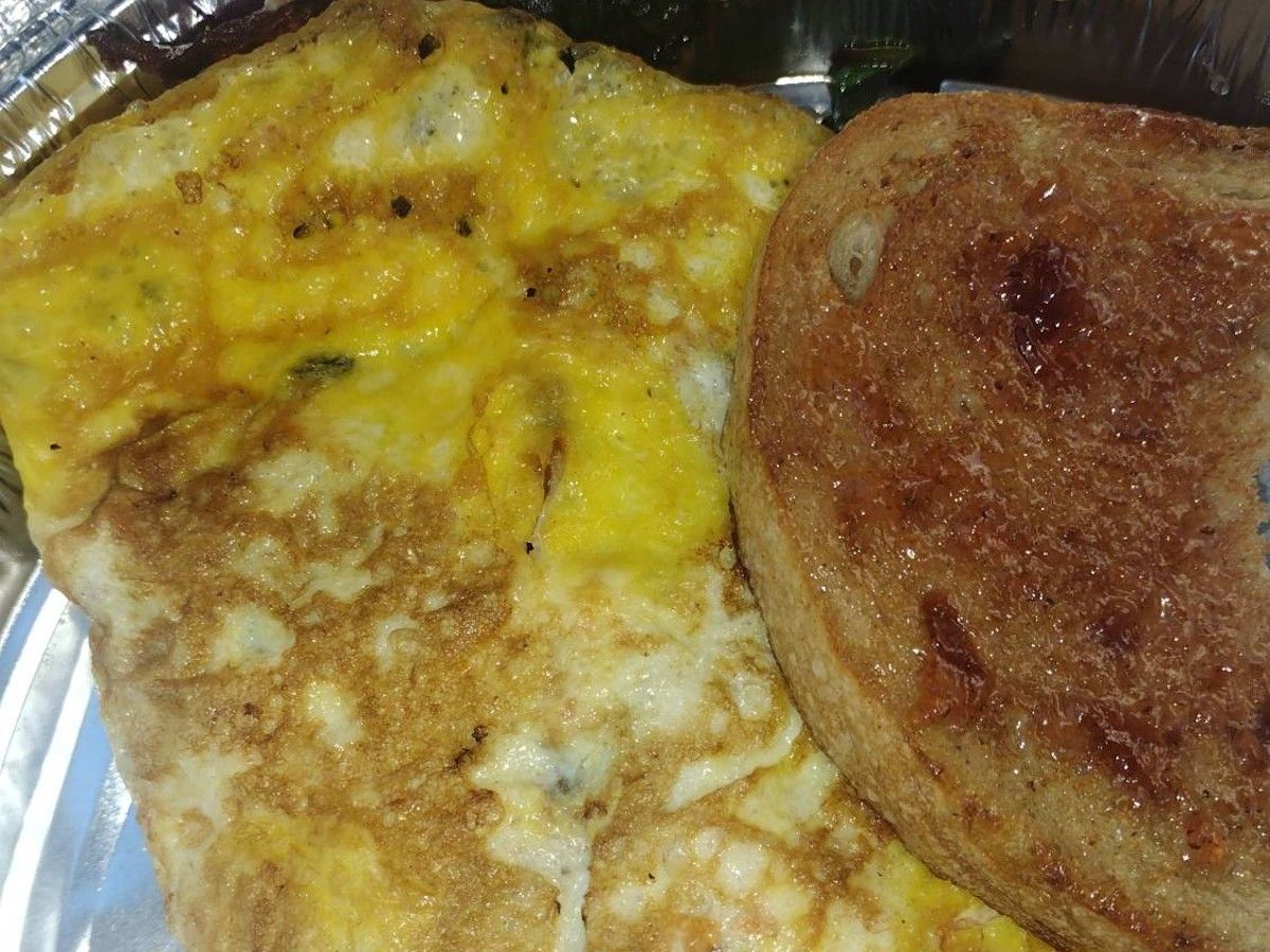 #10. Goat Cheese, Tomatoes, Mushrooms & Spinach Omelette.