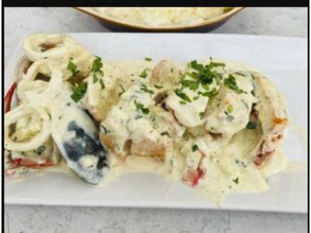 Pechuga Rellena De Mariscos.