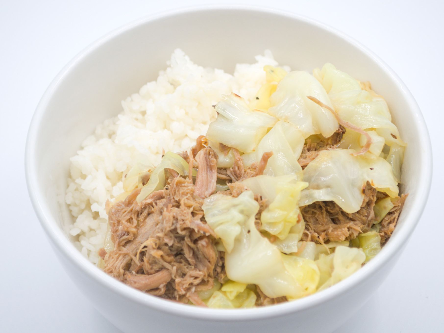 #20 Kalua Pig Cabbage from Yama's Fish Market — Hand-pulled kalua pork tossed with cabbage — rustic and satisfying. Served over white rice.