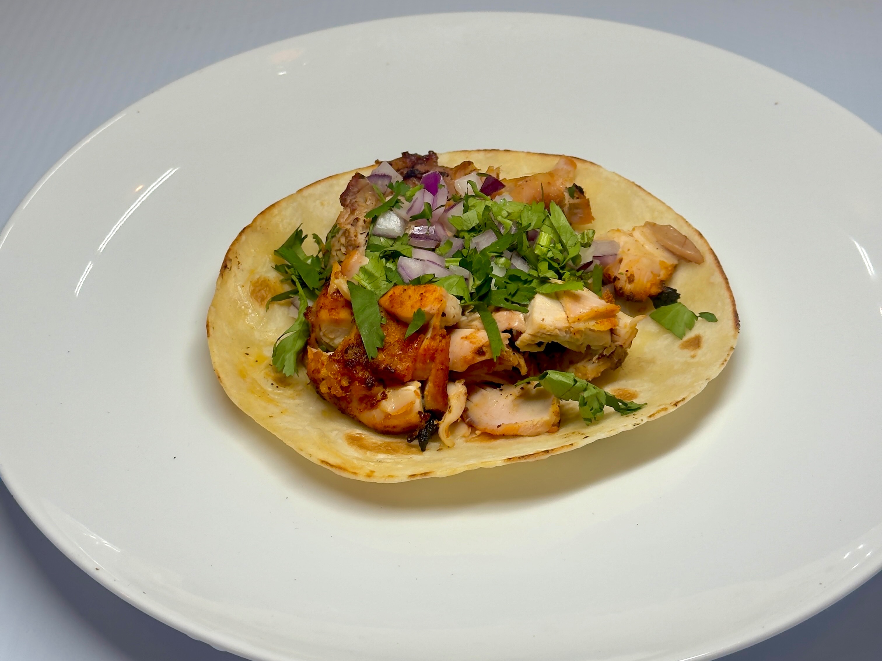 Premium Chicken Tikka Taco.