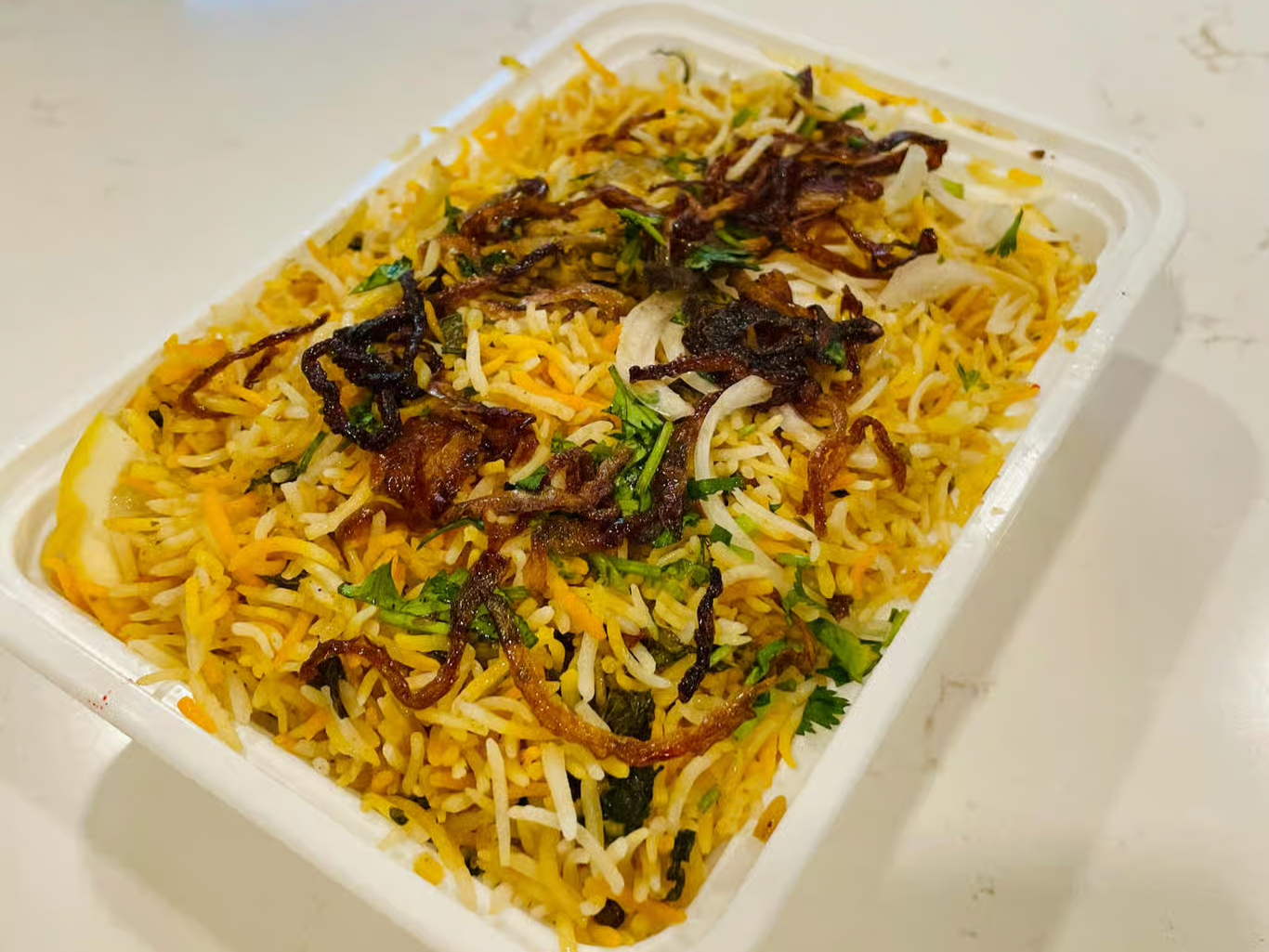 Mutton Dum Biryani.