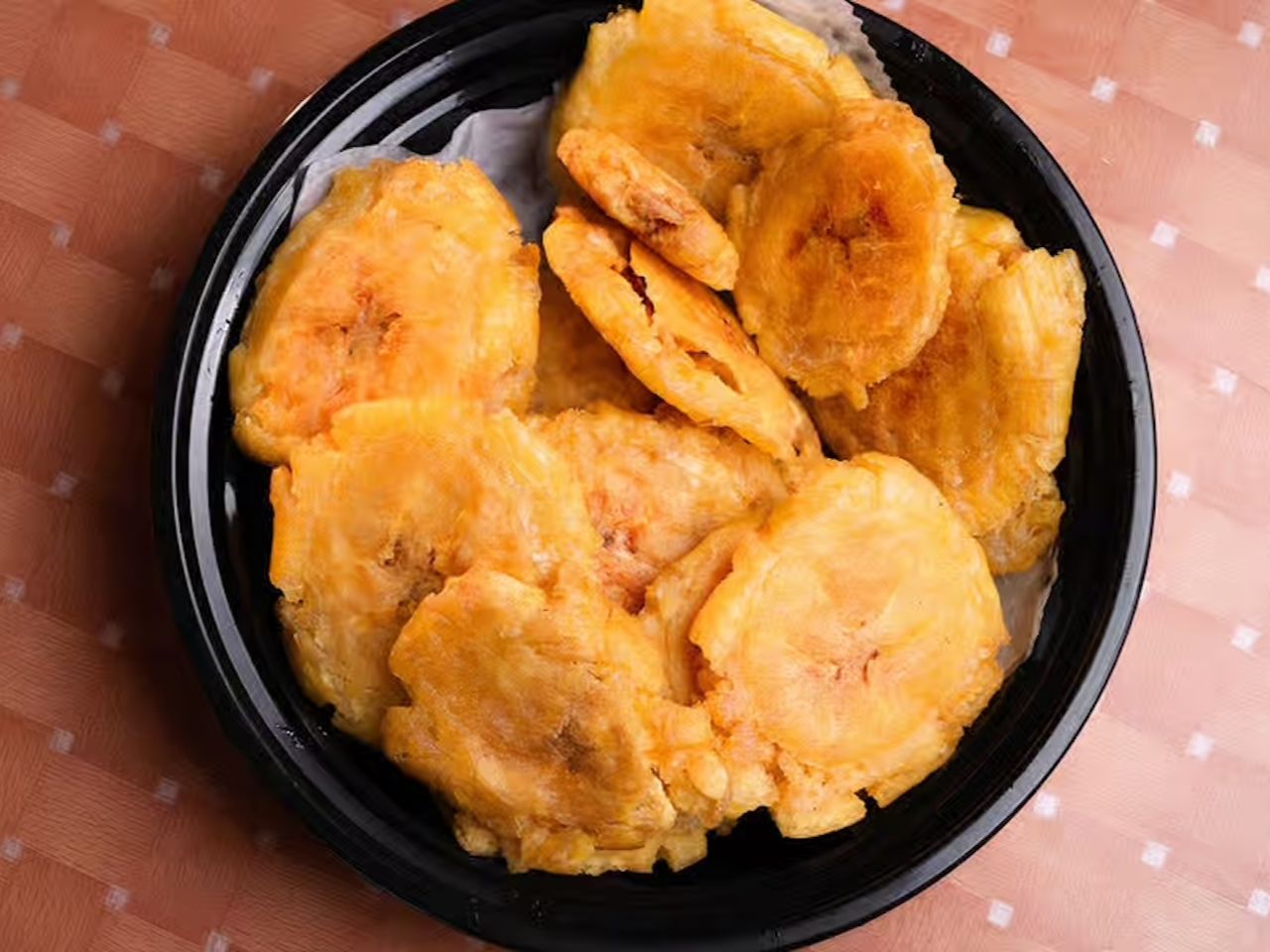 Tostones | Fried green plantains.