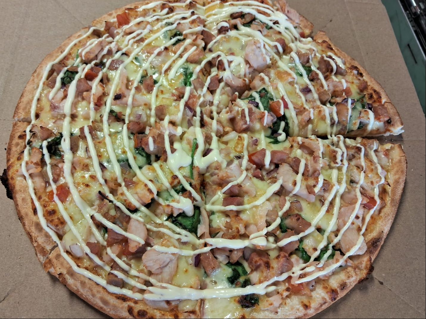 Creamy Chicken & Bacon Pizza.