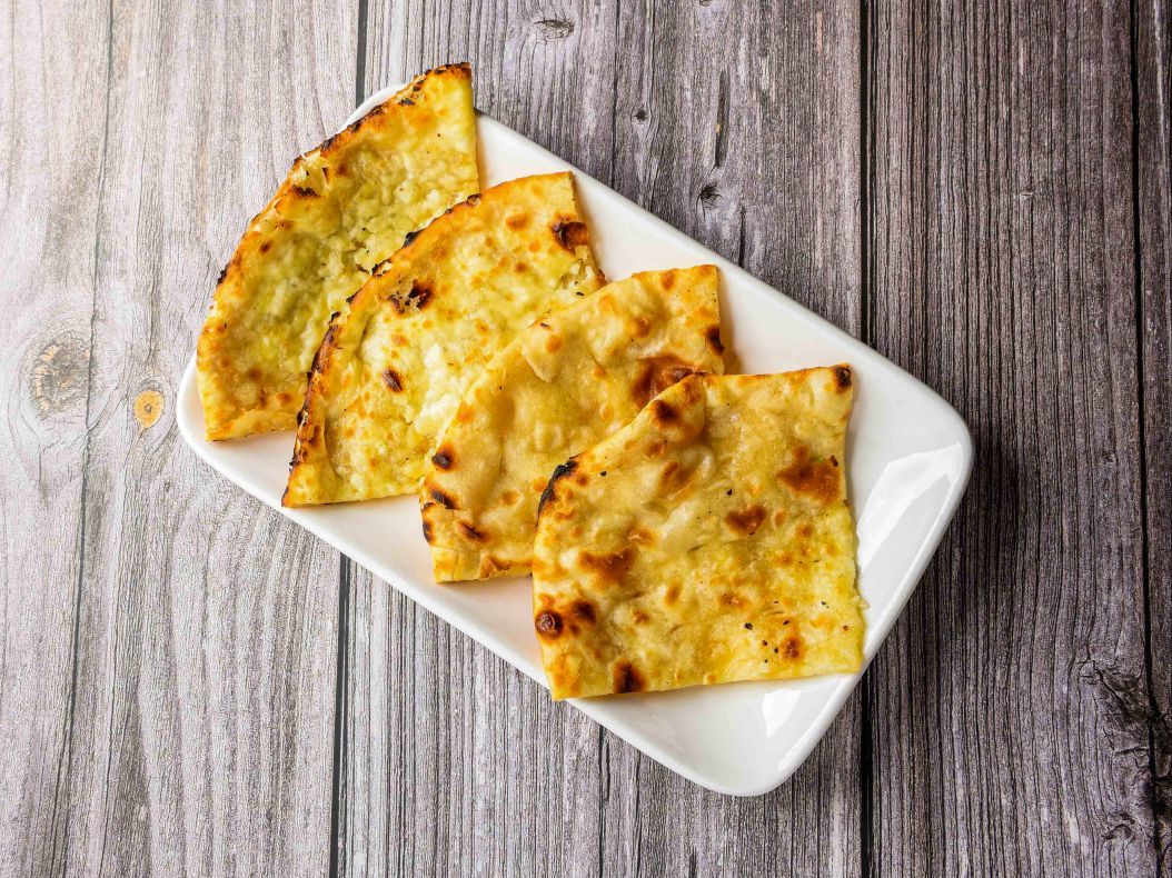 99. Cheese Naan.