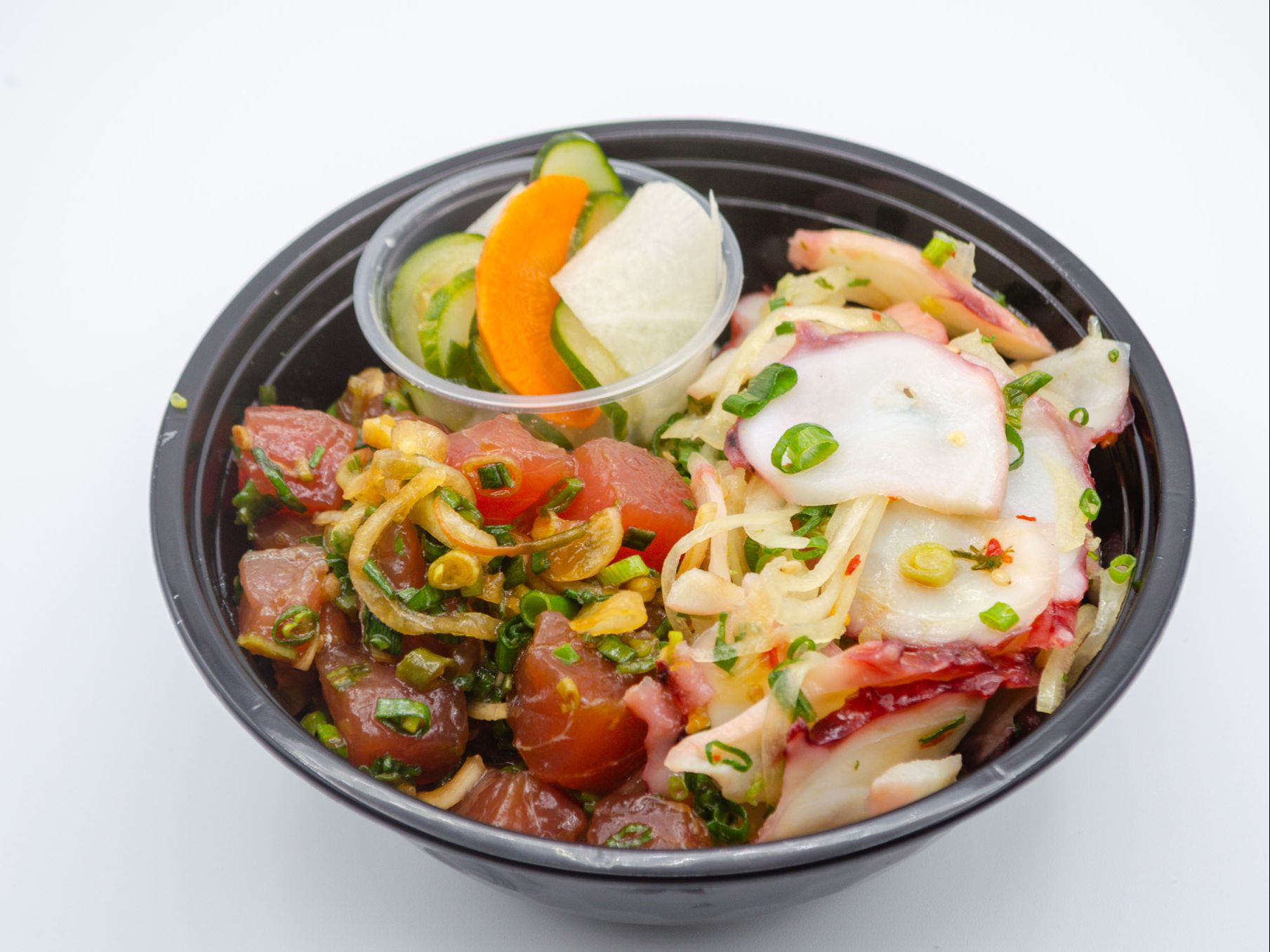 Poke Bowl (Large) from Yama's Fish Market — Your selection of two of our signature ahi or tako recipes, served with rice and your choice of namasu, cucumber kim chee, lomi salmon, ocean salad or taegu.