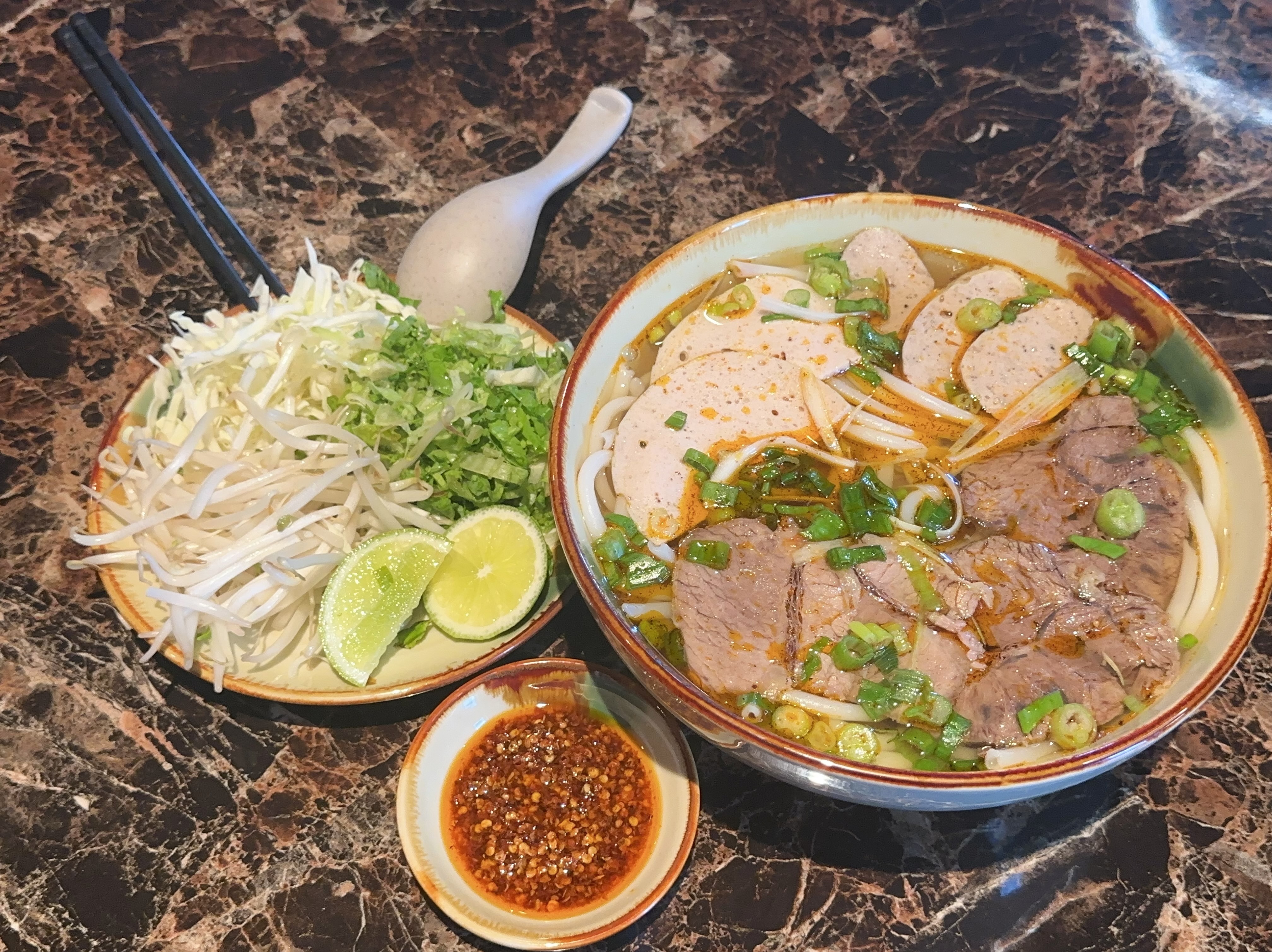 44 BUN BO HUE / spicy Vietnamese beef noodle soup.