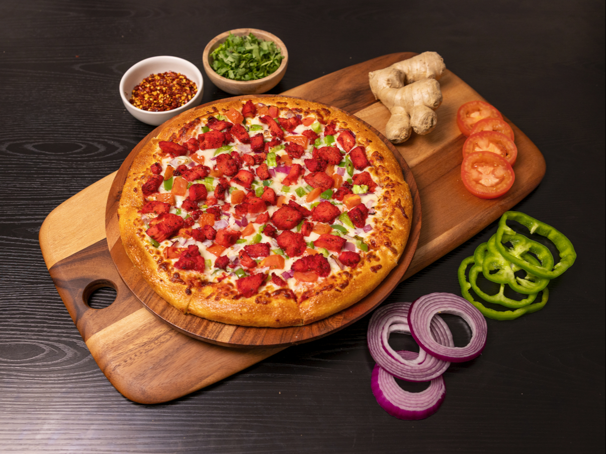 Halal Tandori Chicken Pizza.