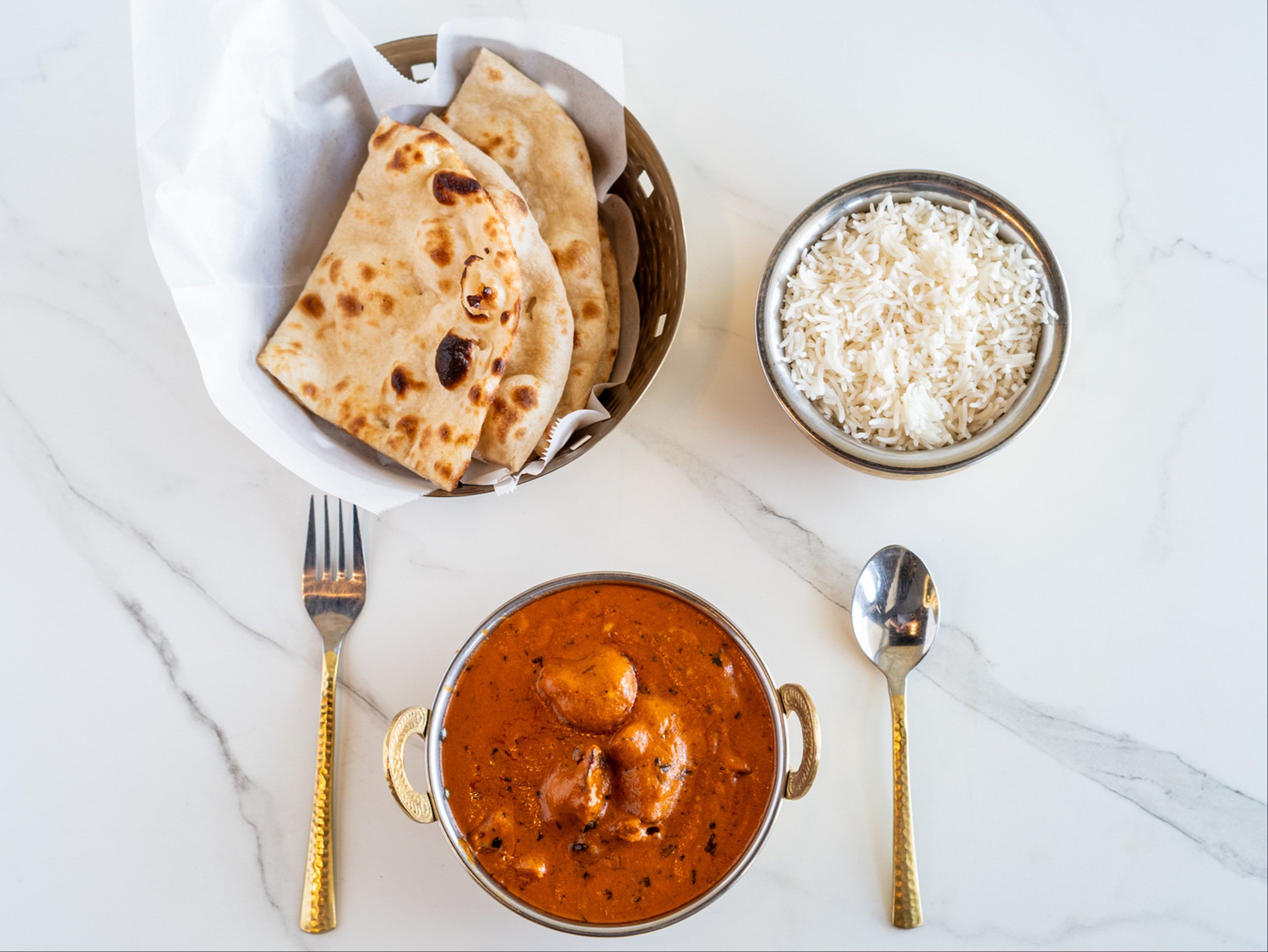 Butter Chicken + Butter Naan + Steamed Basmati Rice.