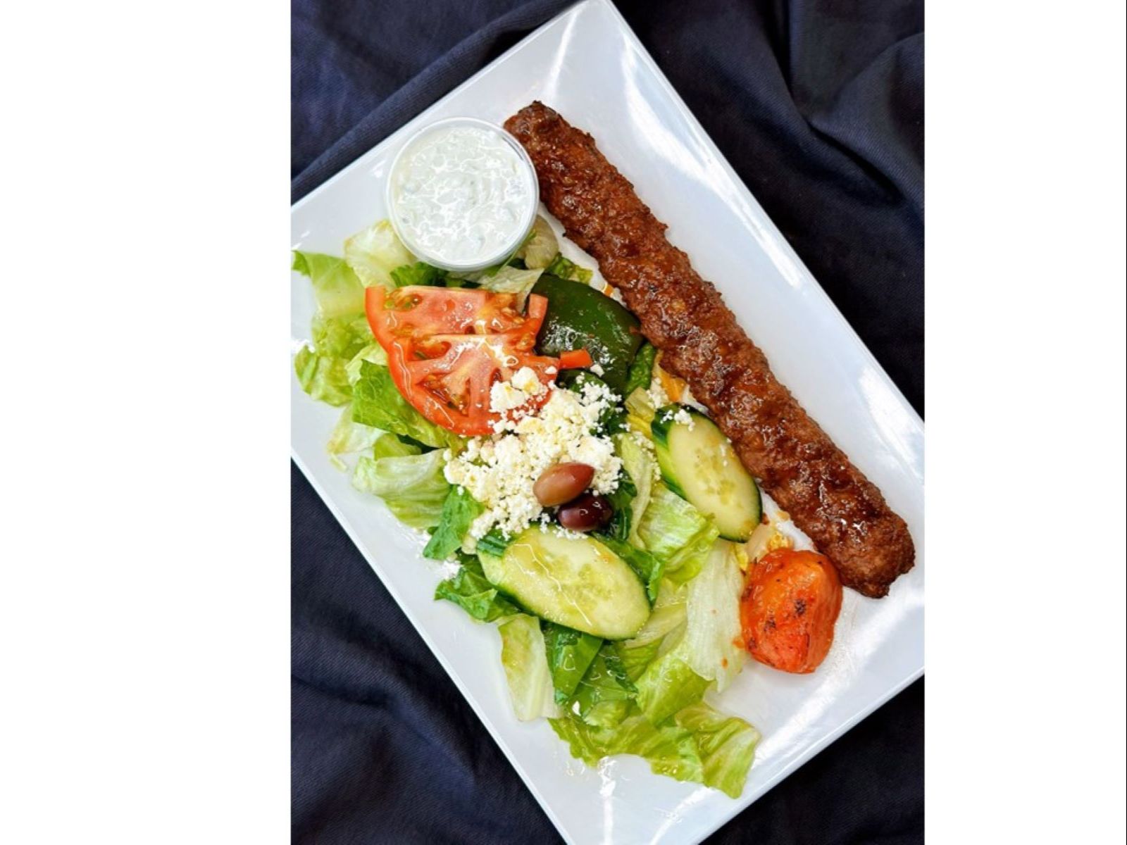 Adana Kebab (1 Skewer)  Over Salad.