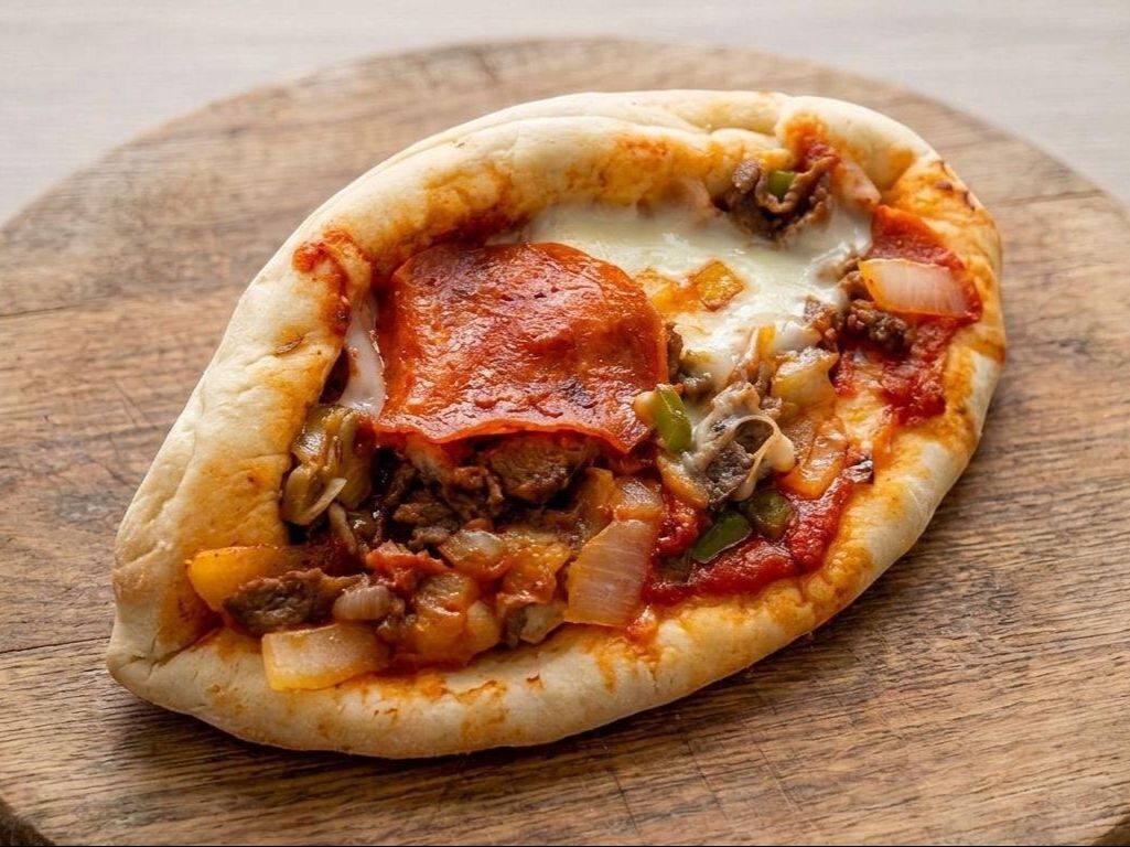 #35 Pizza Cheesesteak (Reg).