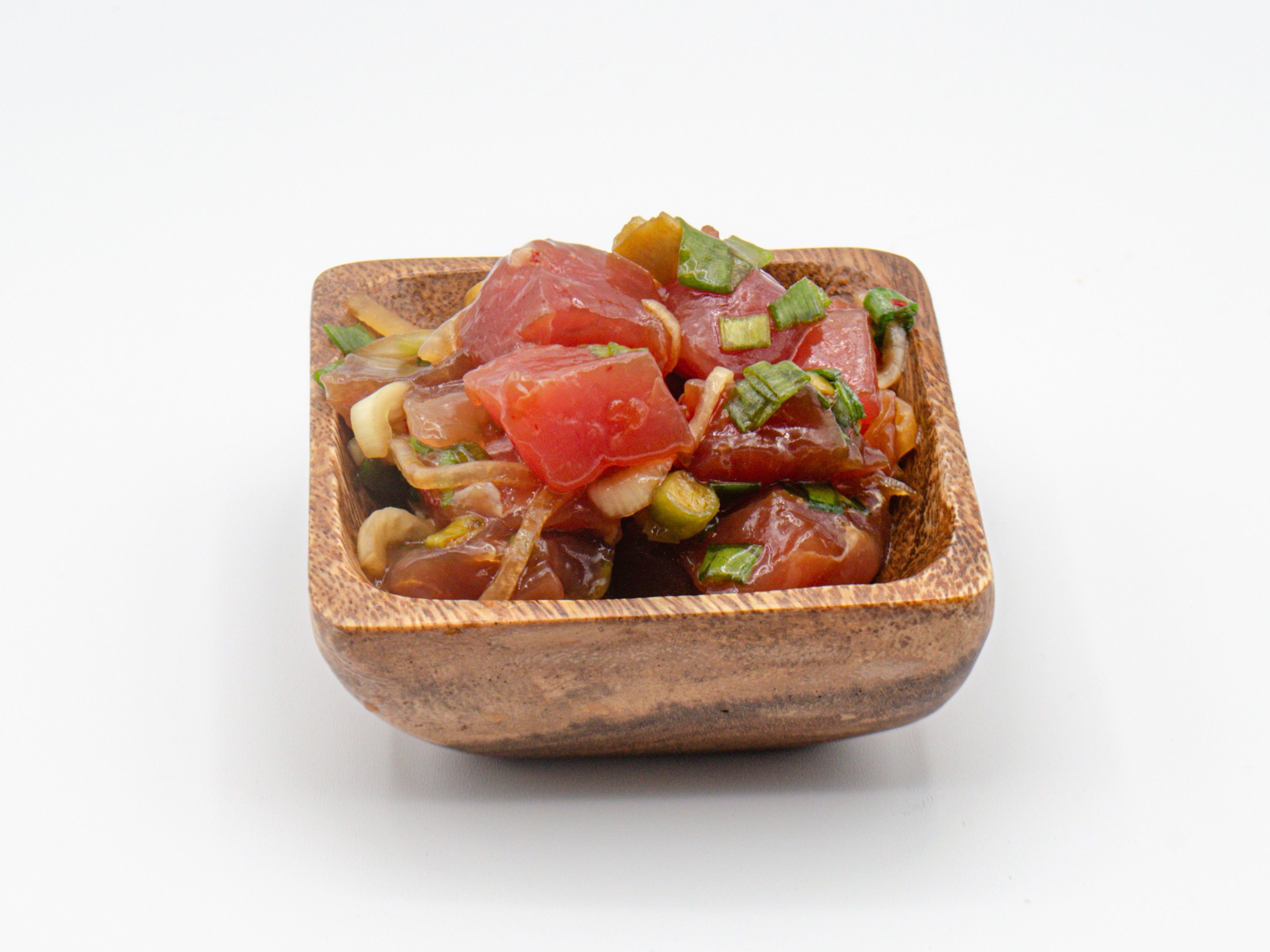 Shoyu Ahi Poke from Yama's Fish Market — A customer favorite, our shoyu ahi poke is mixed with sliced round onions, green onions and our secret shoyu mix. Click for available sizes/pricing