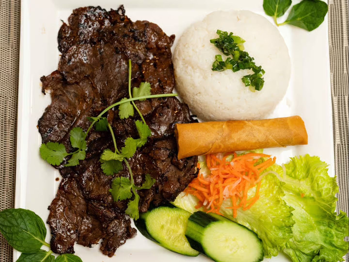 C63. Rice w/ Grilled Beef, Egg Roll.