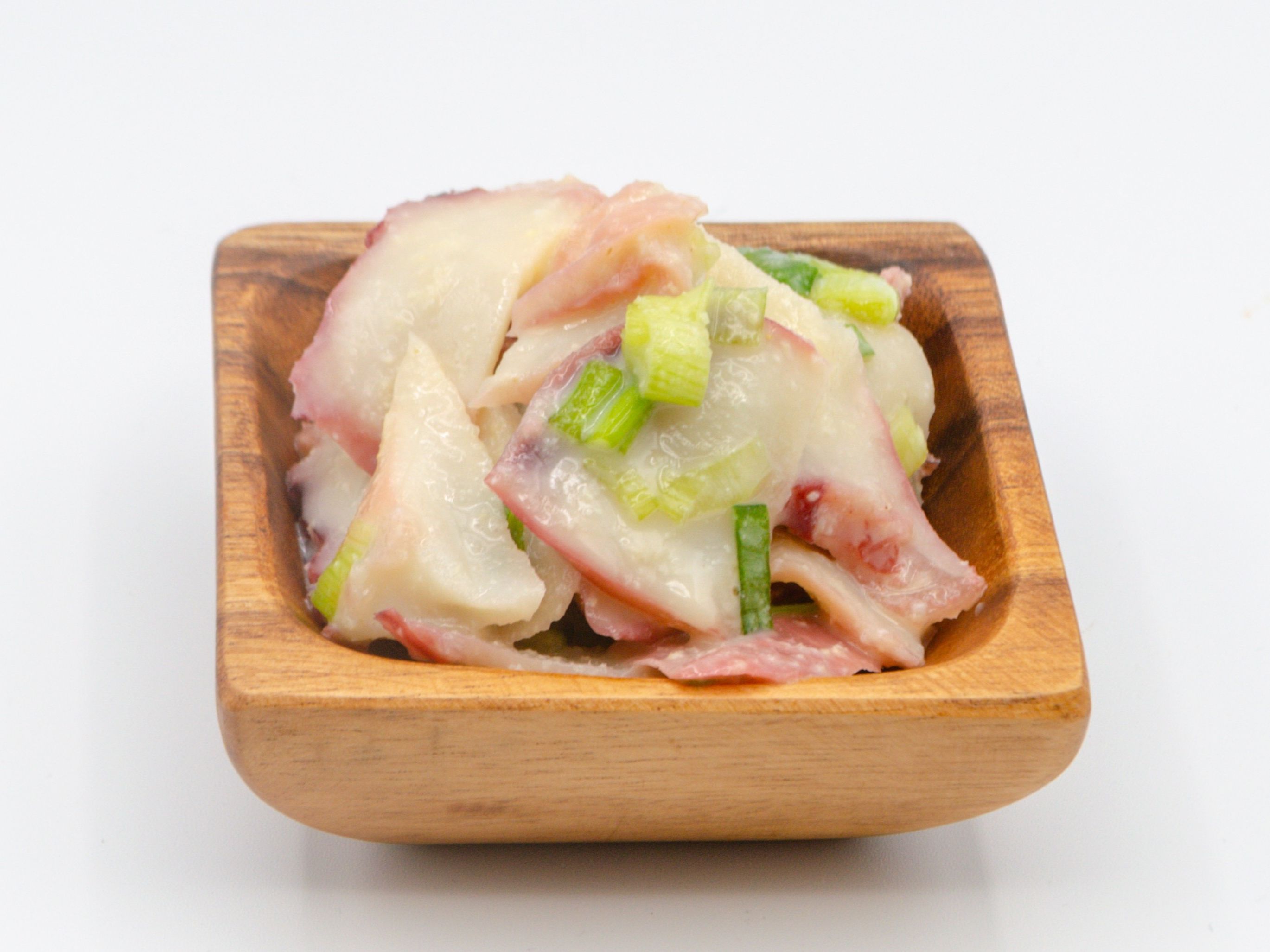 Miso Tako Poke from Yama's Fish Market — Thinly cut tako, sliced round onions, green onions with Yama's special miso sauce. Click for available sizes/pricing