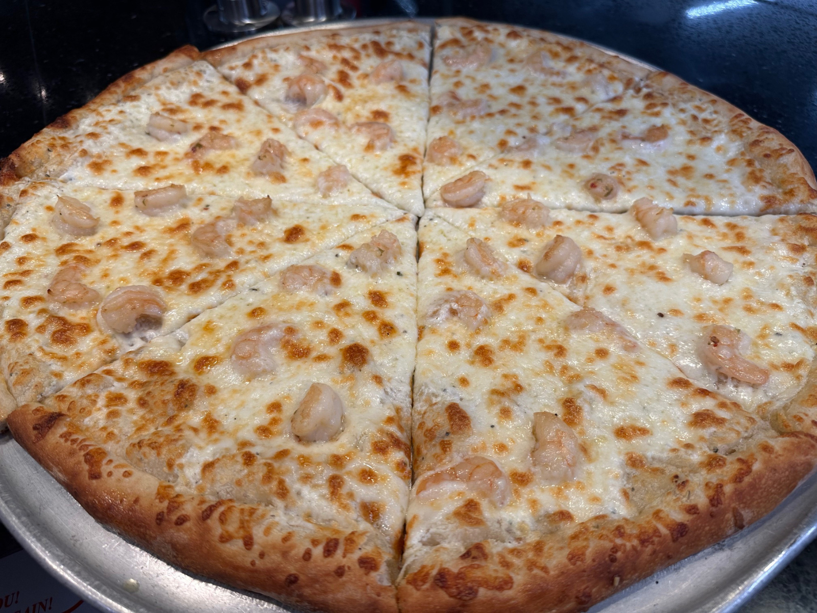 Shrimp Scampi Pizza.