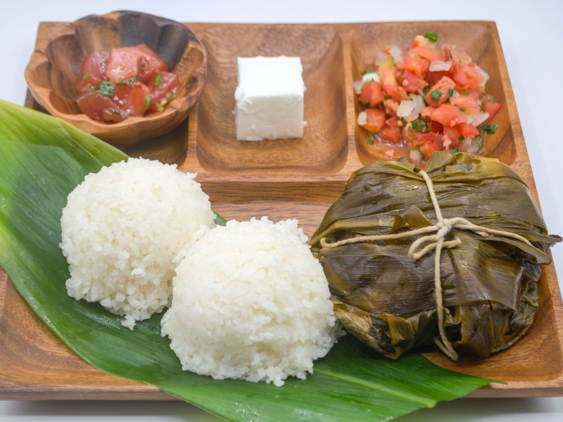 #3 Lau Lau, Lomi, Poke & Haupia from Yama's Fish Market — A full Hawaiian plate — our signature lau lau, lomi salmon, your choice of poke, white rice, and haupia (traditional Hawaiian coconut pudding) for dessert.