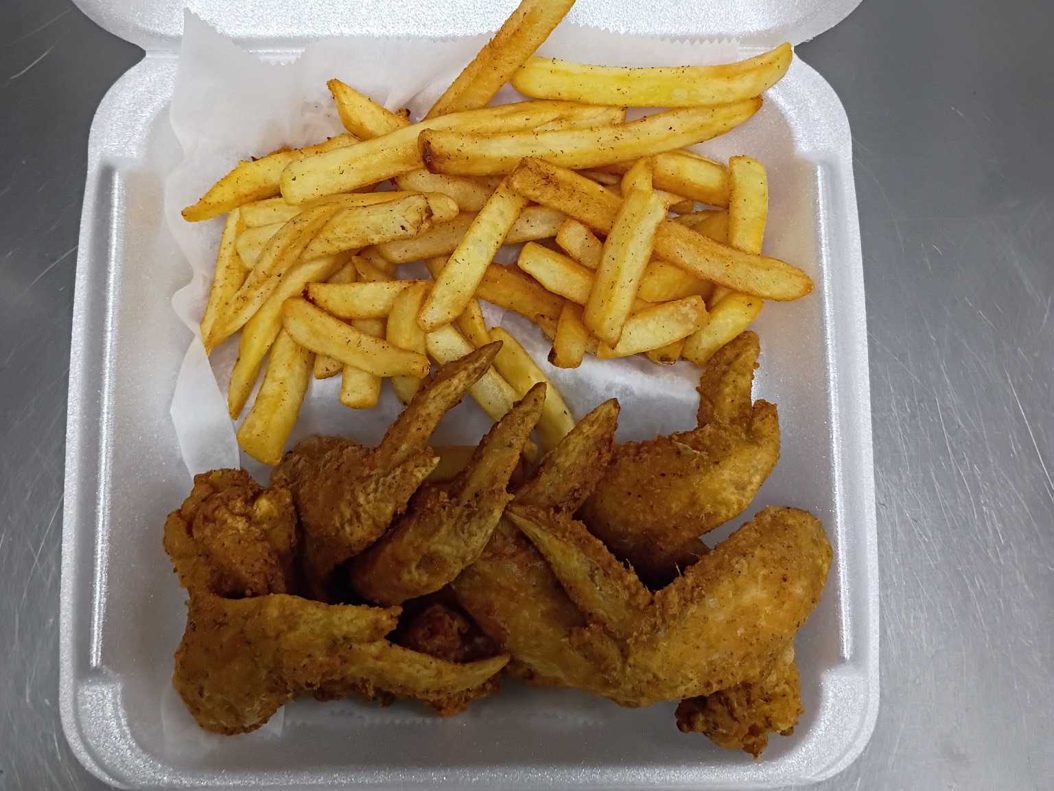 10 Whole Wings + Fries + Can Soda