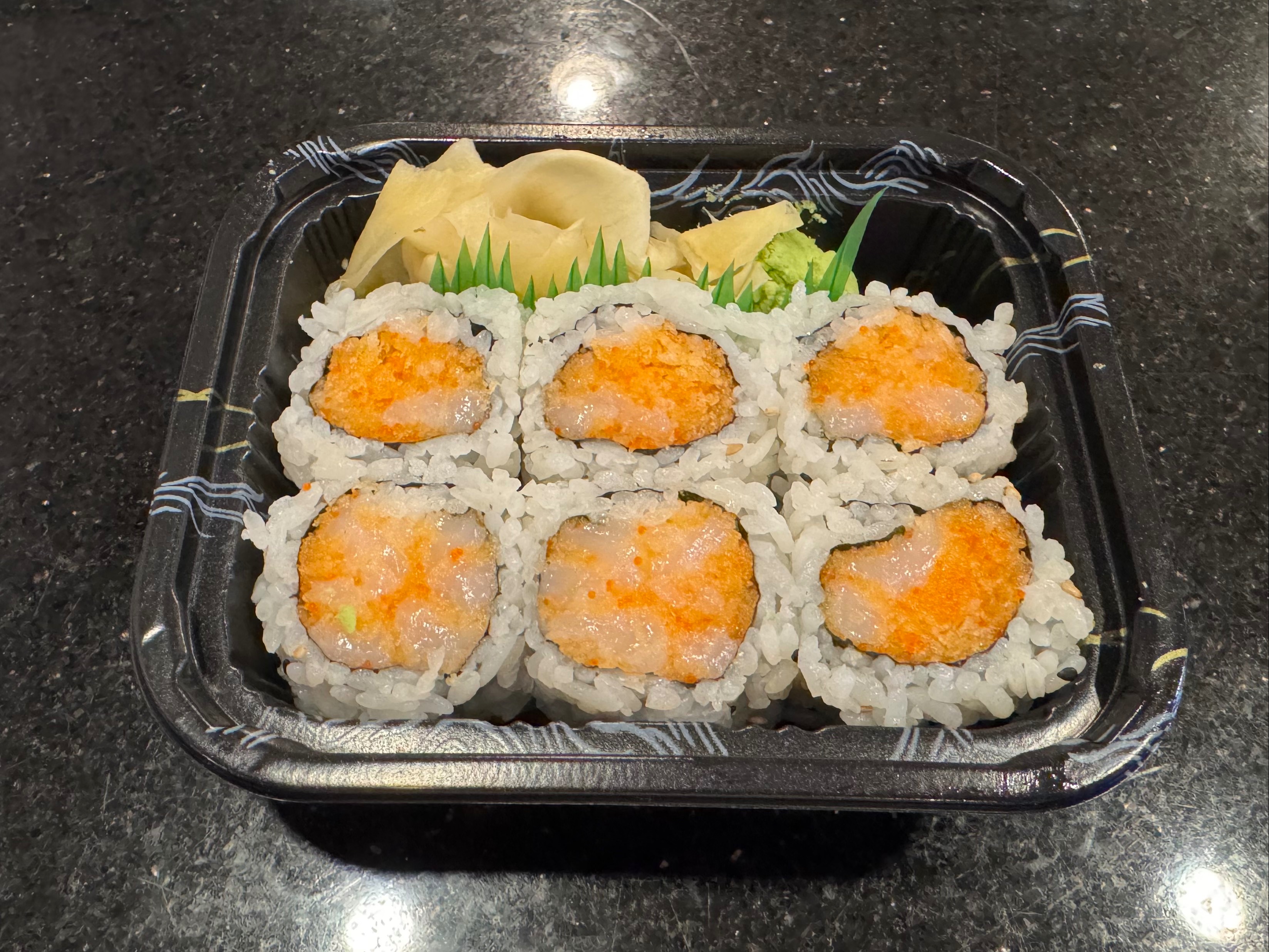 Spicy Scallop Crunch Roll*.