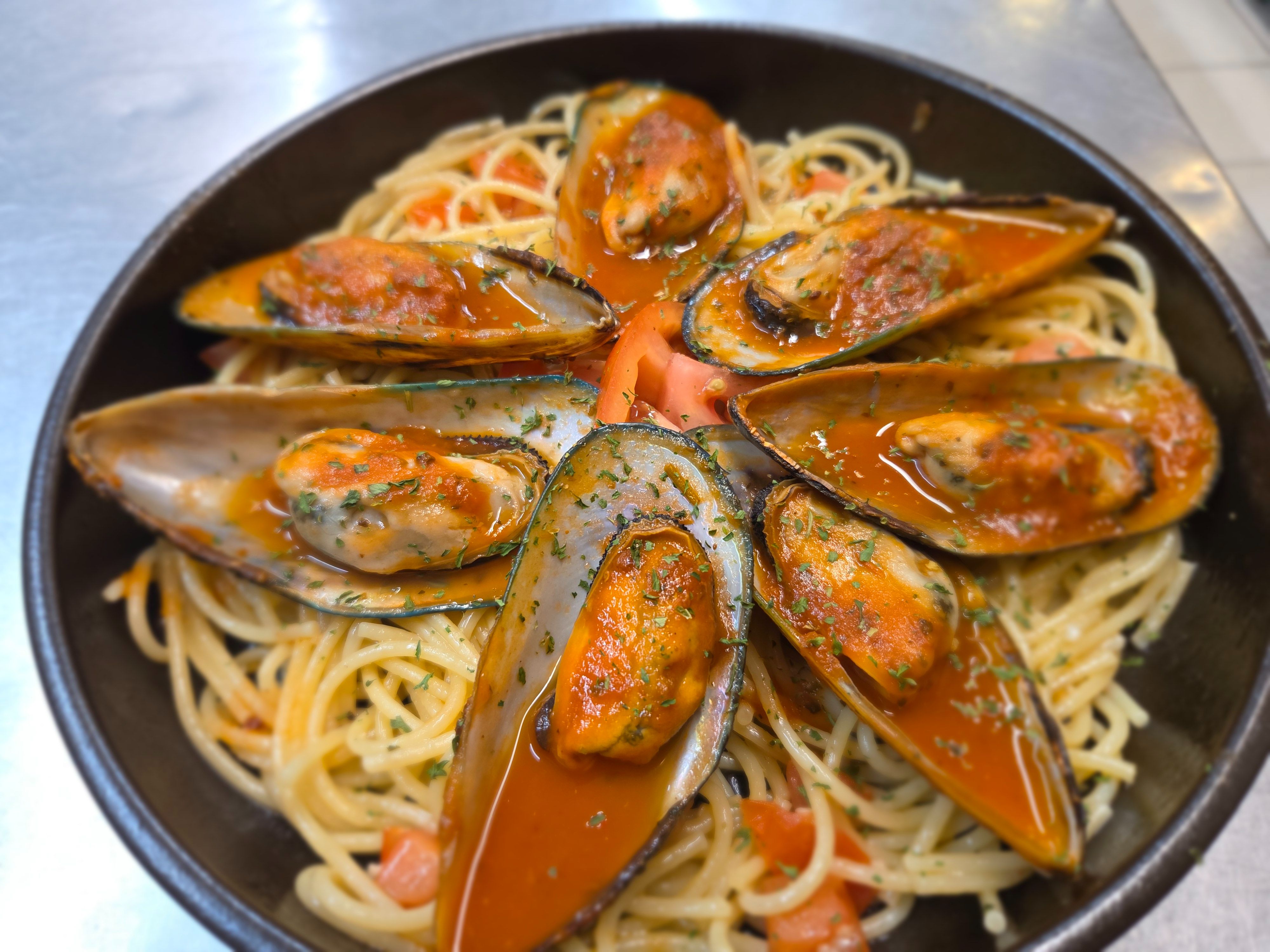 Mussels Marinara Over Pasta.