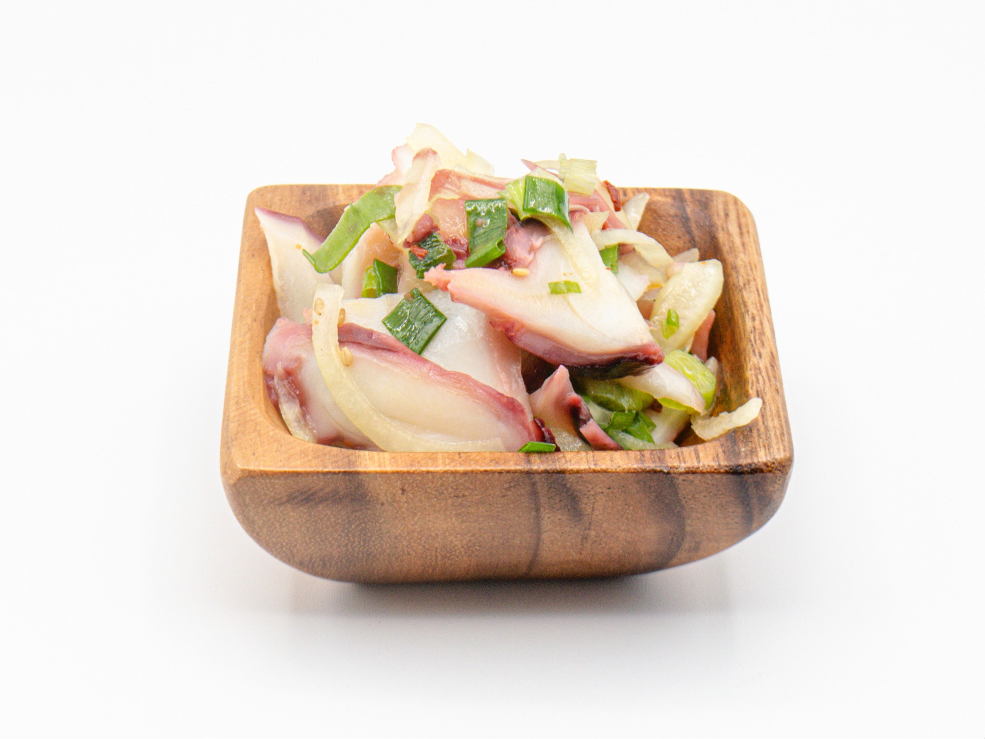 Onion Tako Poke from Yama's Fish Market — Thinly cut tako, sliced round onions and green onions. Click for available sizes/pricing
