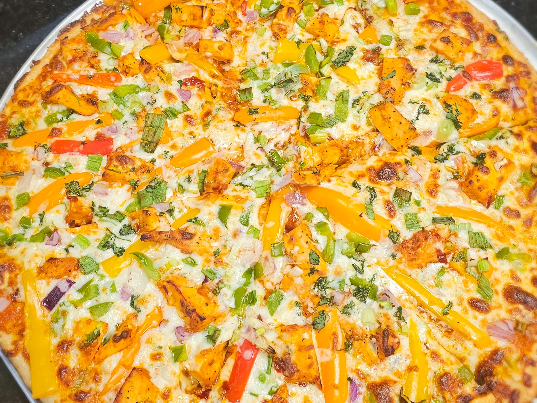 Schezwan Vegetable Pizza.