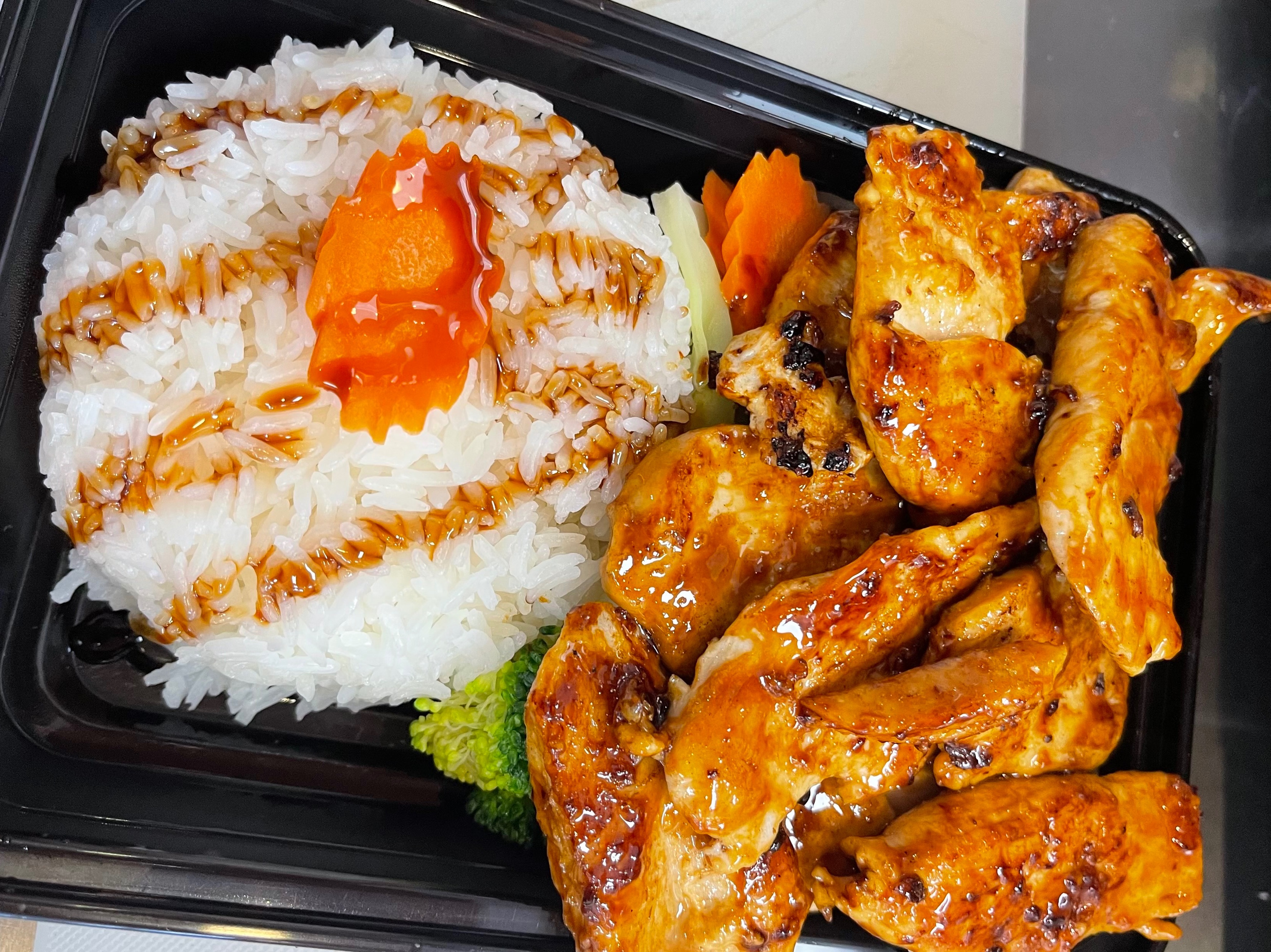 #09 Teriyaki Chicken, Steamed Veggies & Rice.