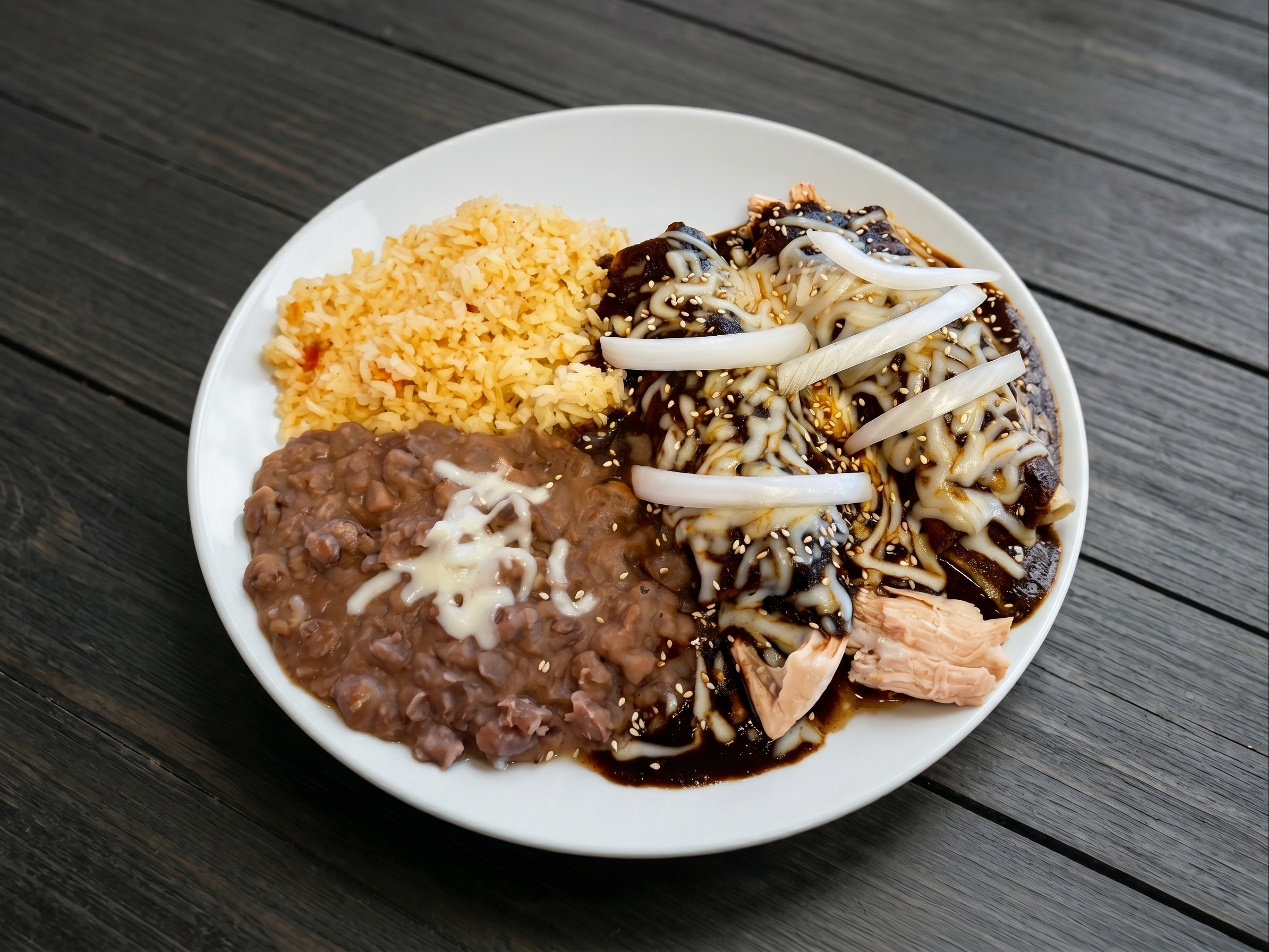 2 Chicken Mole Enchiladas Plato.