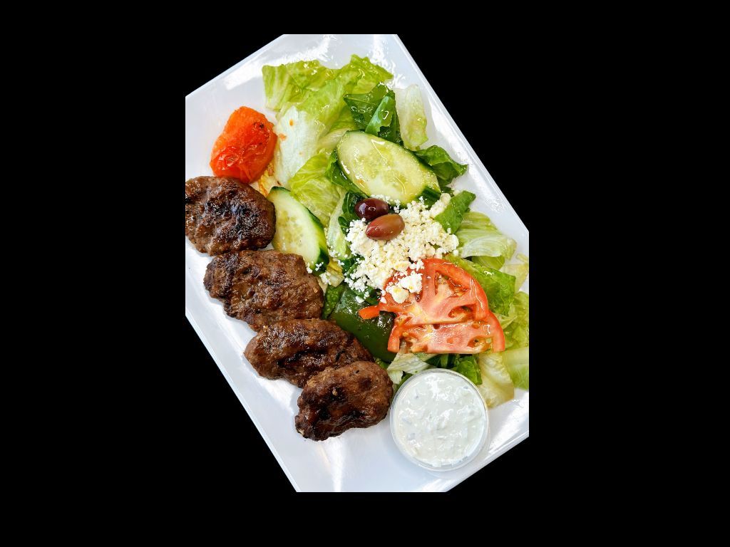 Kofte Kebab (4 Pieces) Over Salad.