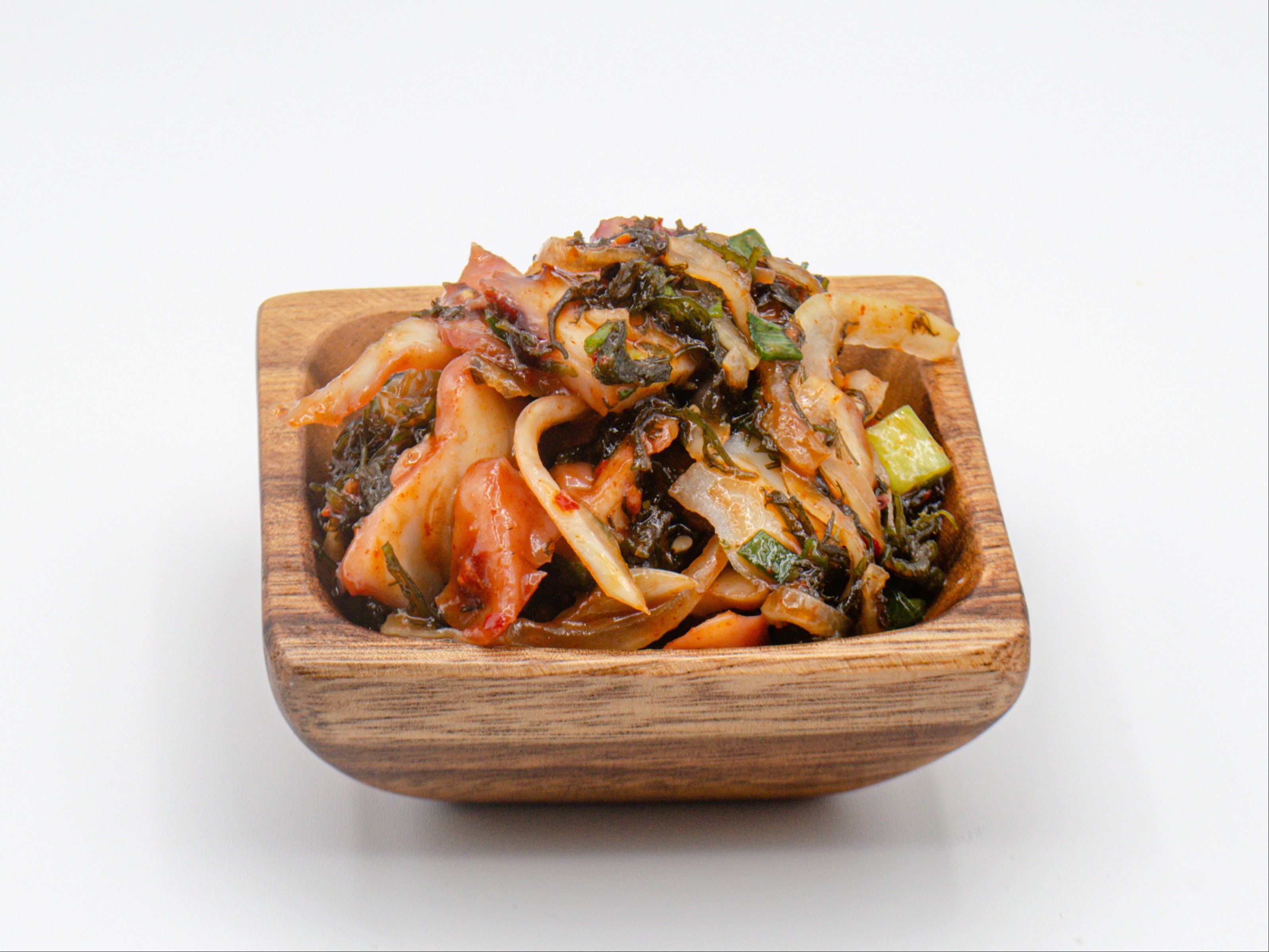 Spicy Tako Poke from Yama's Fish Market — Thinly cut tako, sliced round onions and green onions with the Yama's spicy sauce. Click for available sizes/pricing