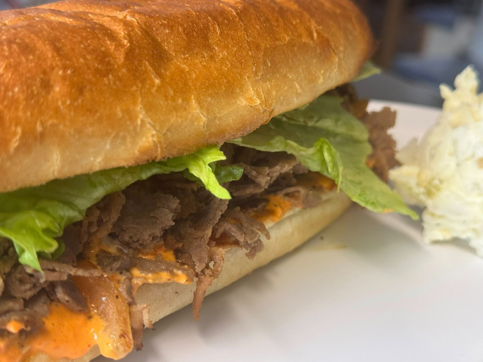 Roasted Red Mohawk Cheesesteak.