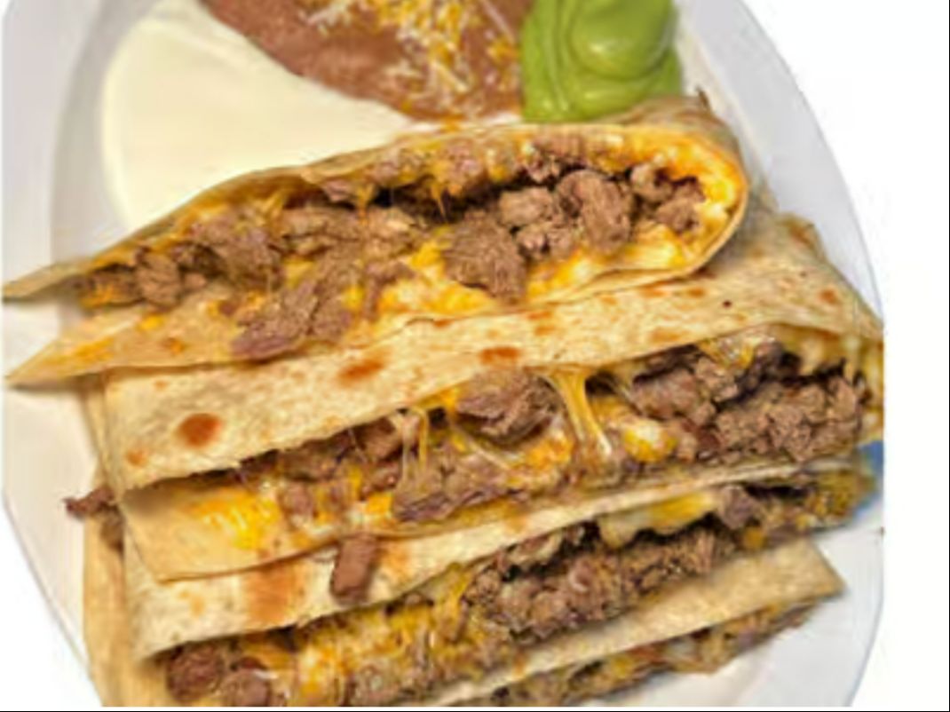Carnitas Super Quesadilla.