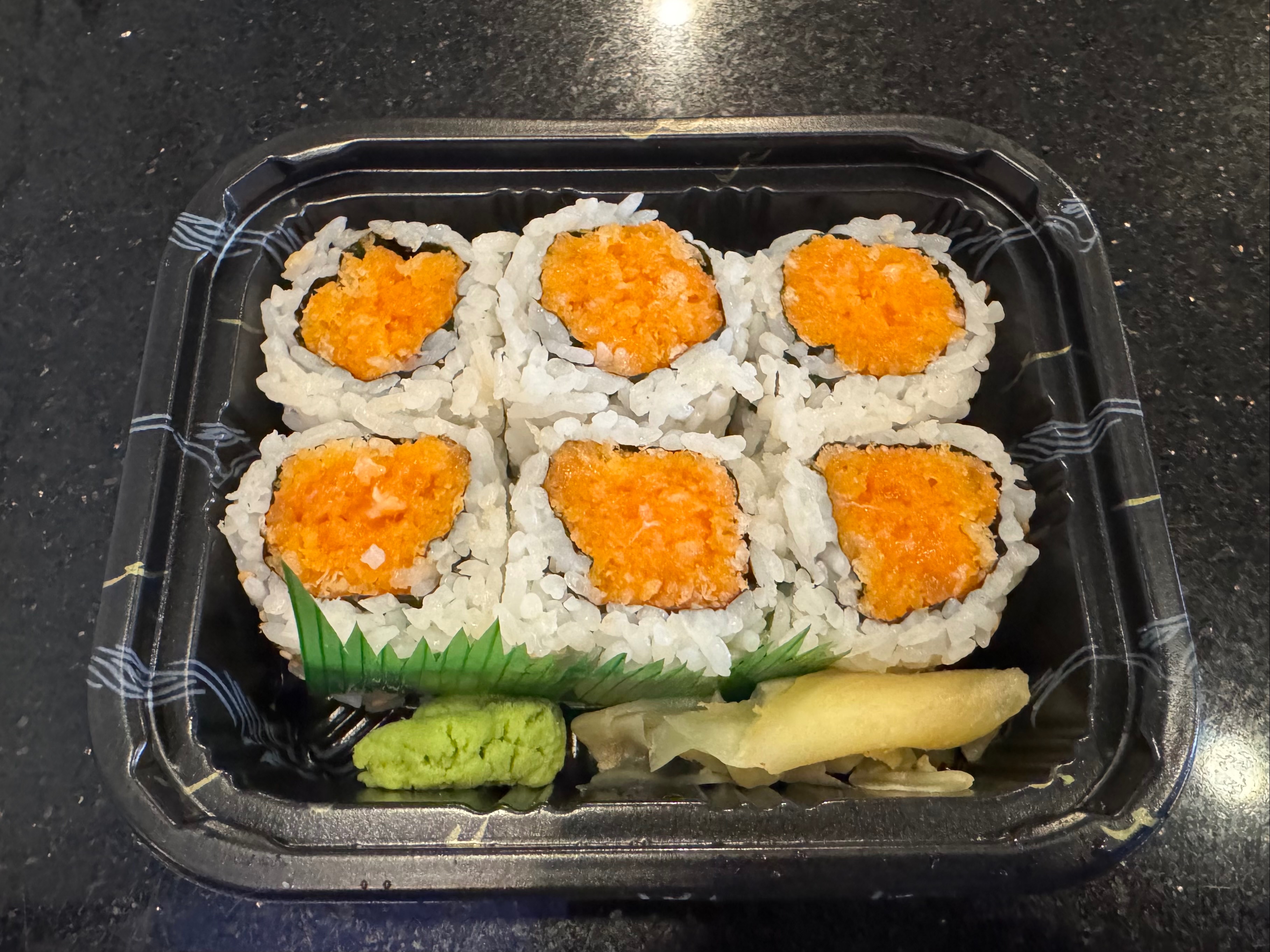 Spicy Salmon Crunch Roll*.