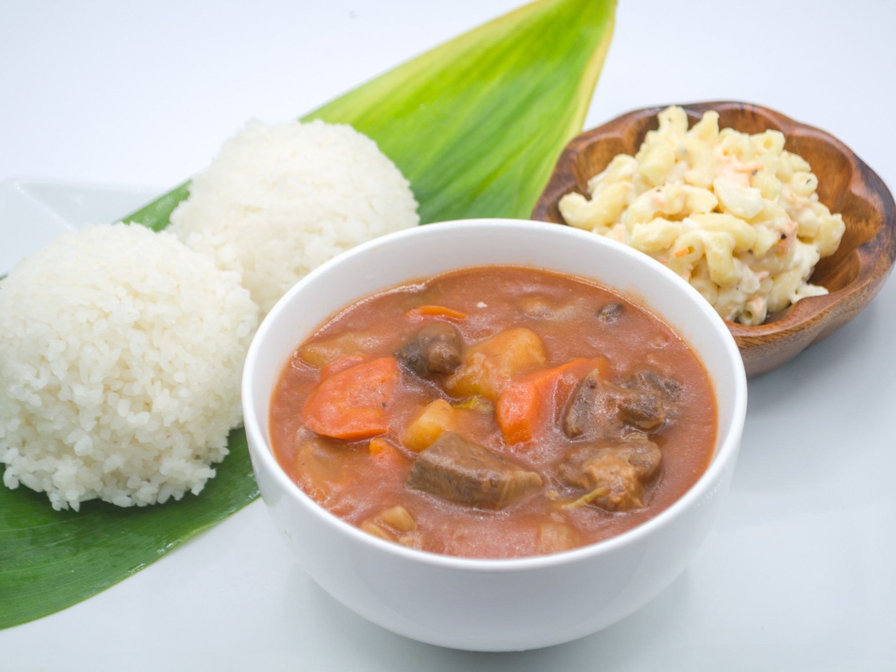 #10 Beef Stew from Yama's Fish Market — Local-style beef stew, slow-simmered with beef, potatoes, carrots, and onions in a rich gravy. Served with white rice and mac salad.