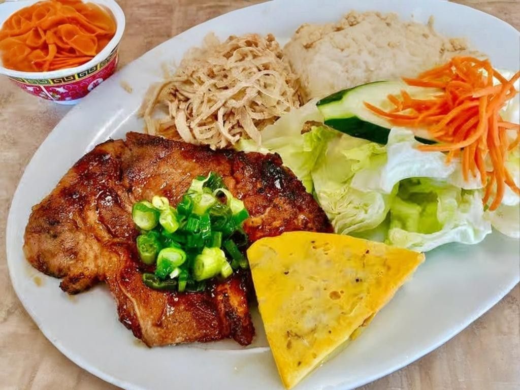 C69. Rice w/ Grilled Pork Chop, Shredded Pork, Egg.