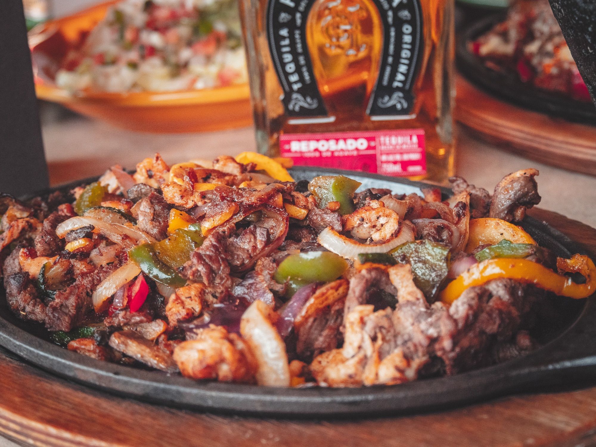 FLAMING CHEESE FAJITAS.