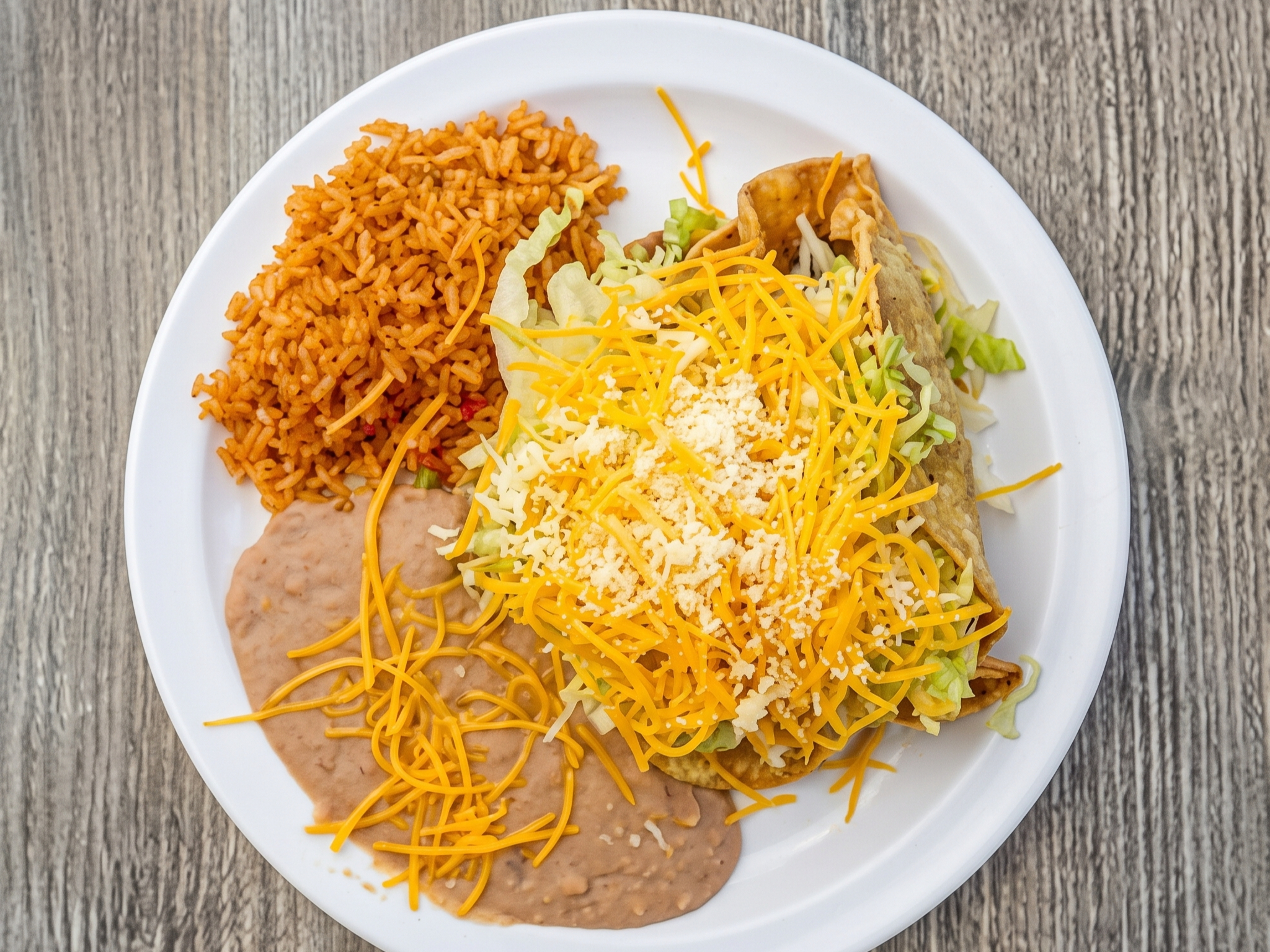 SOFT Chicken Taco, Lettuce, Cheddar, Cotija
