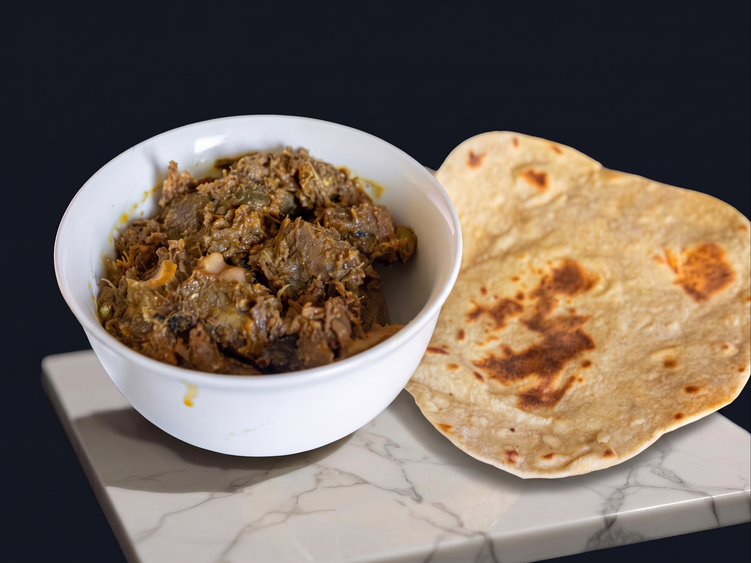 Chapathi with Goat Curry.
