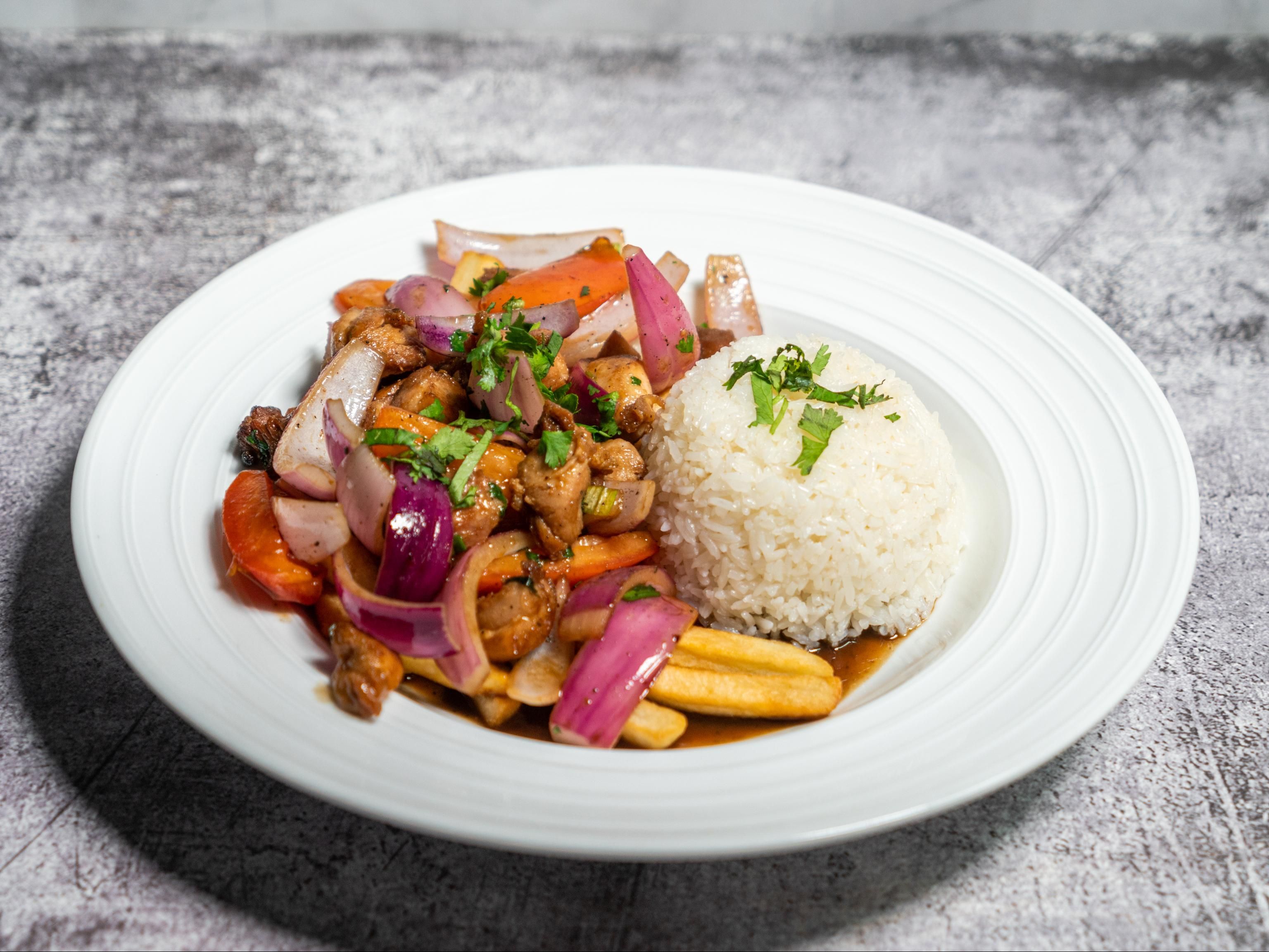 2 Saltado De Pollo.