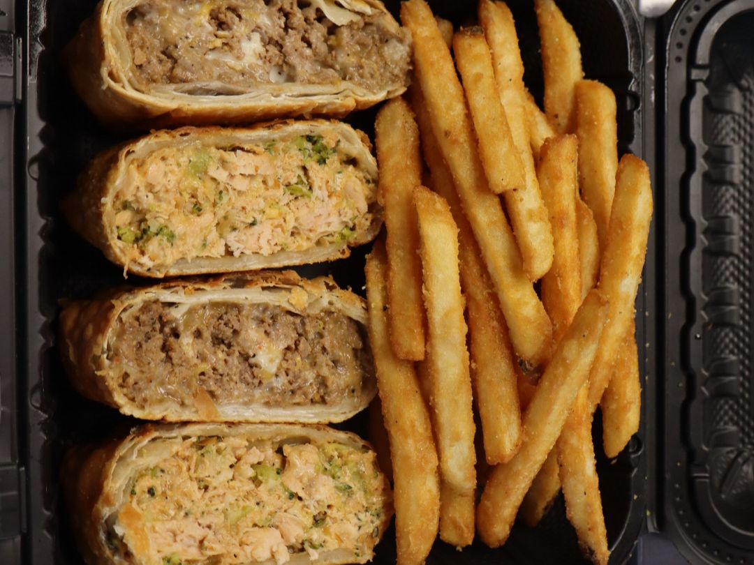 Half cheesesteak & half salmon eggrolls W/fries