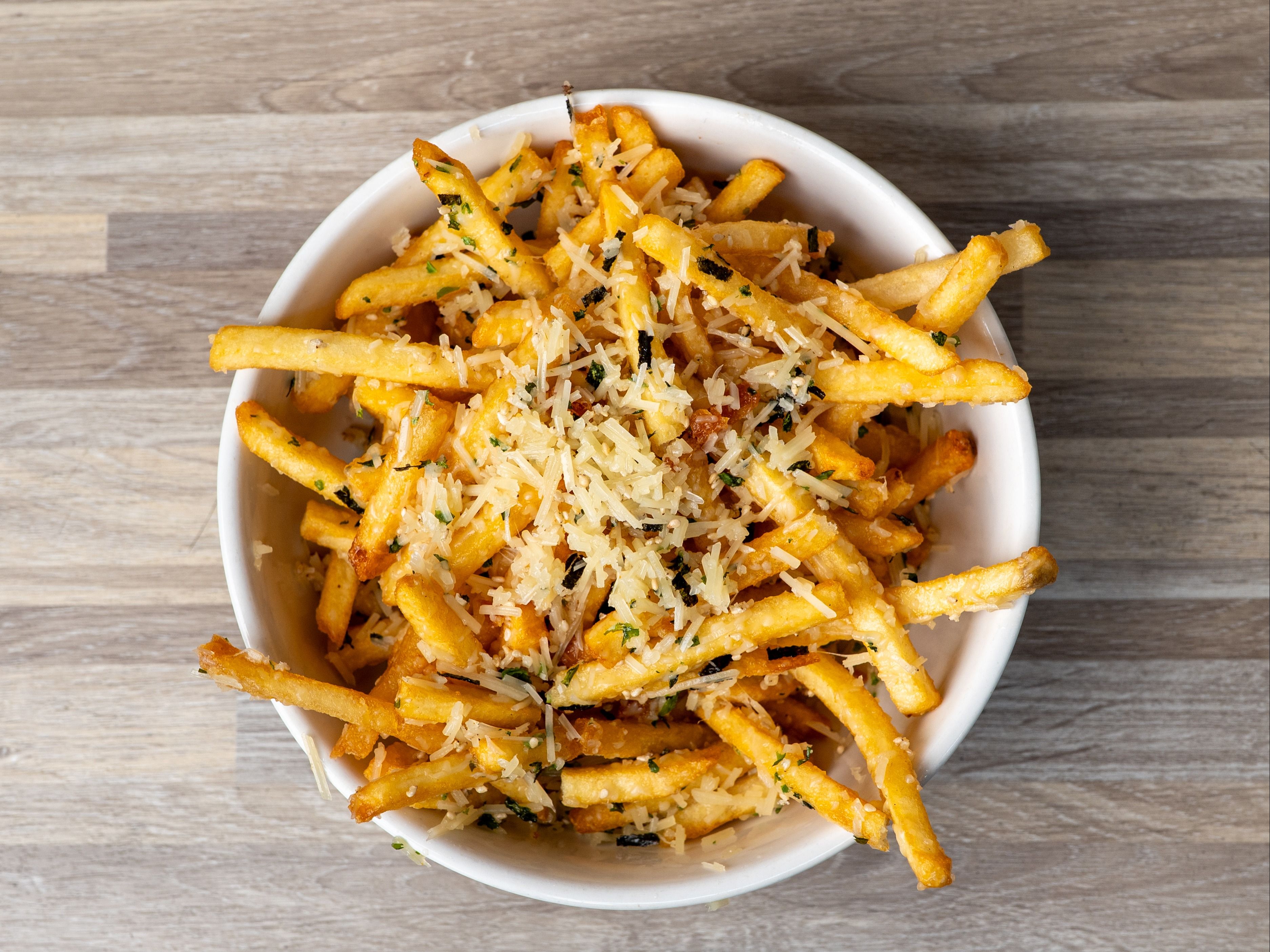 TRUFFLE PARMESAN FRIES.