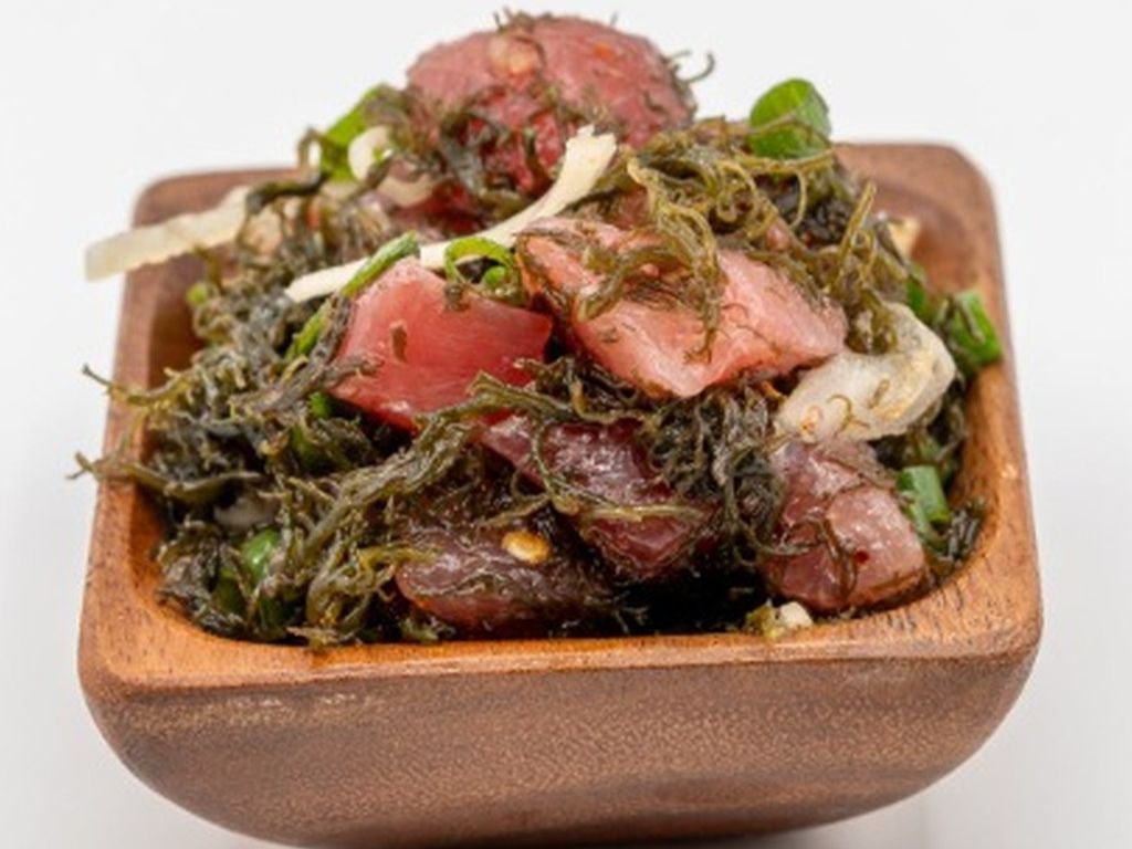 Limu Ahi Poke from Yama's Fish Market — A customer favorite, our limu ahi poke is mixed with ogo, sliced round onions, green onions and mixed to perfection. Click for available sizes/pricing