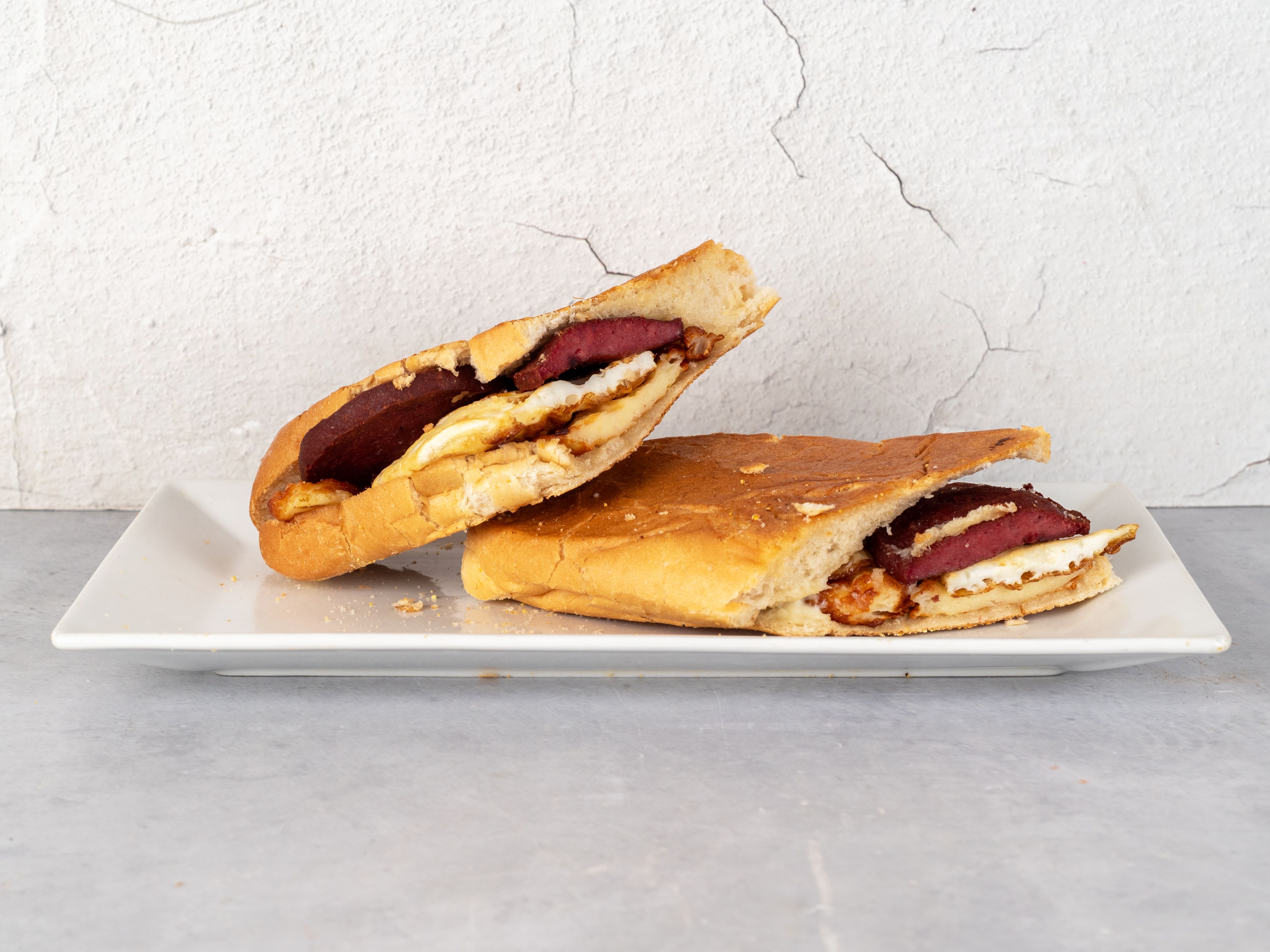 Dominican Sandwich (eggs, salami and fried cheese).