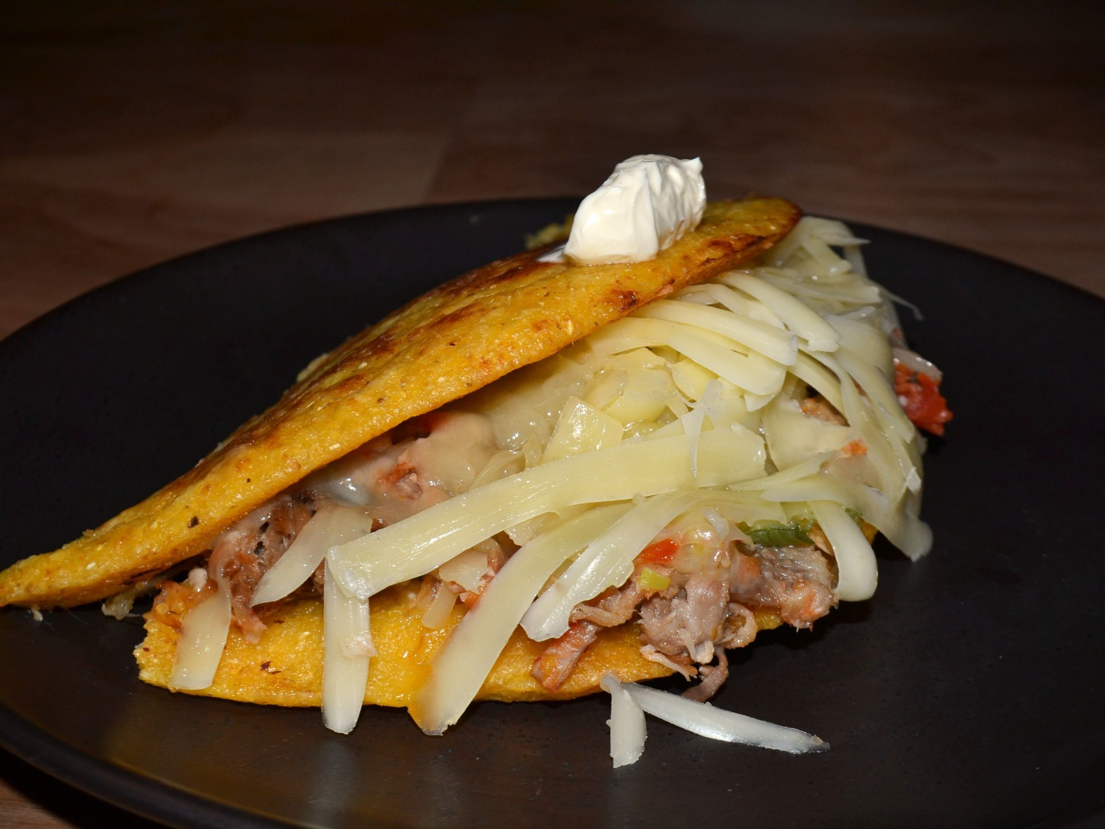 Sweet Corn Bread with Shredded Beef / Cachapa de Carne Mechada y Queso de Mano.