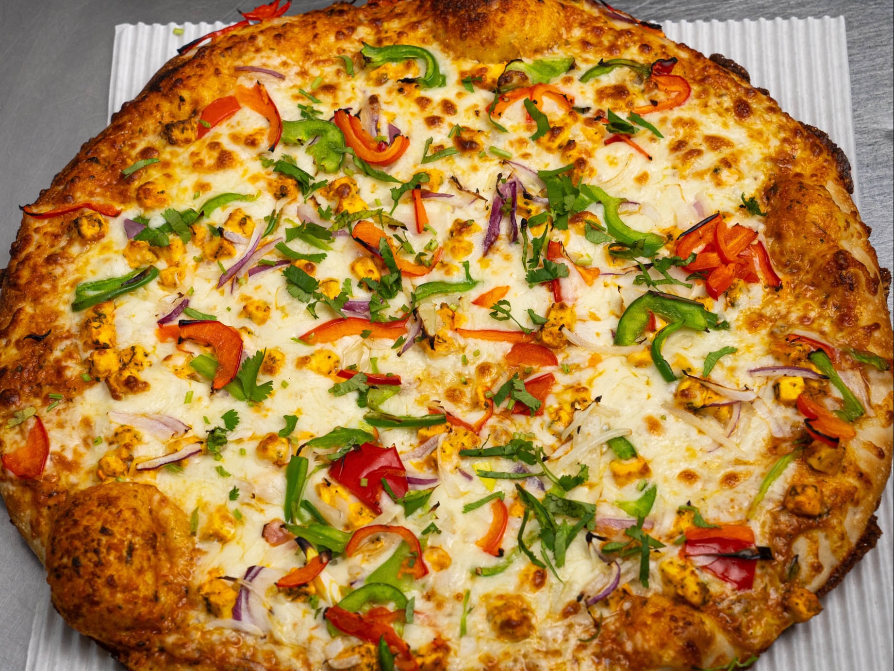 Paneer Tikka Masala Pizza