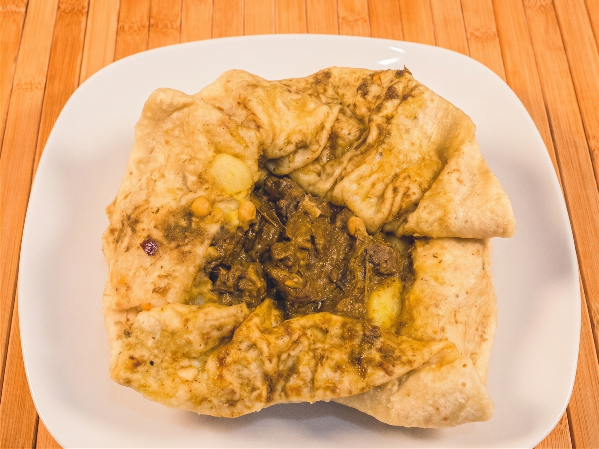 Curry Goat - Roti (Dhalpuri).