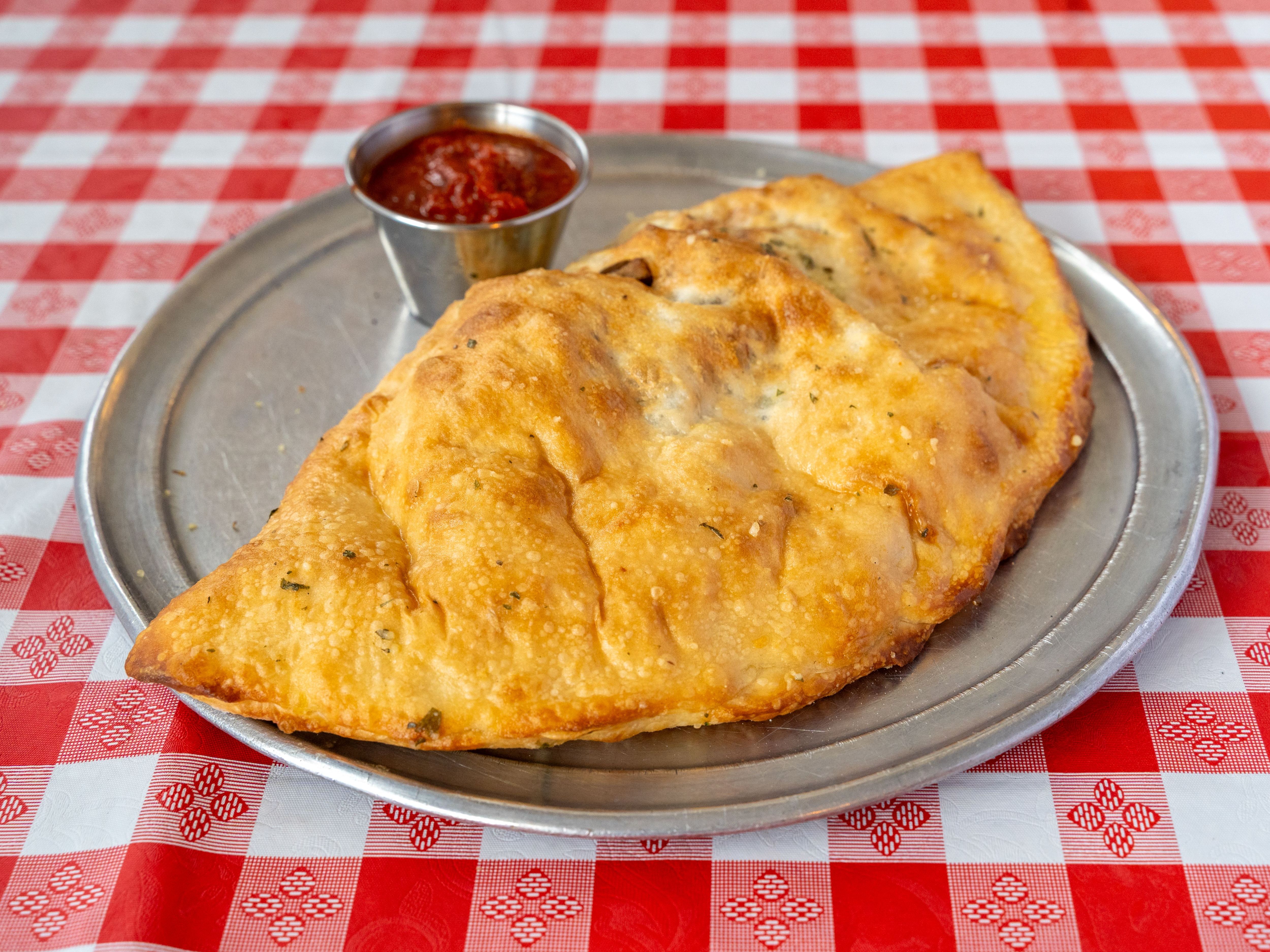 Steak, Onion, Mushroom Calzone.